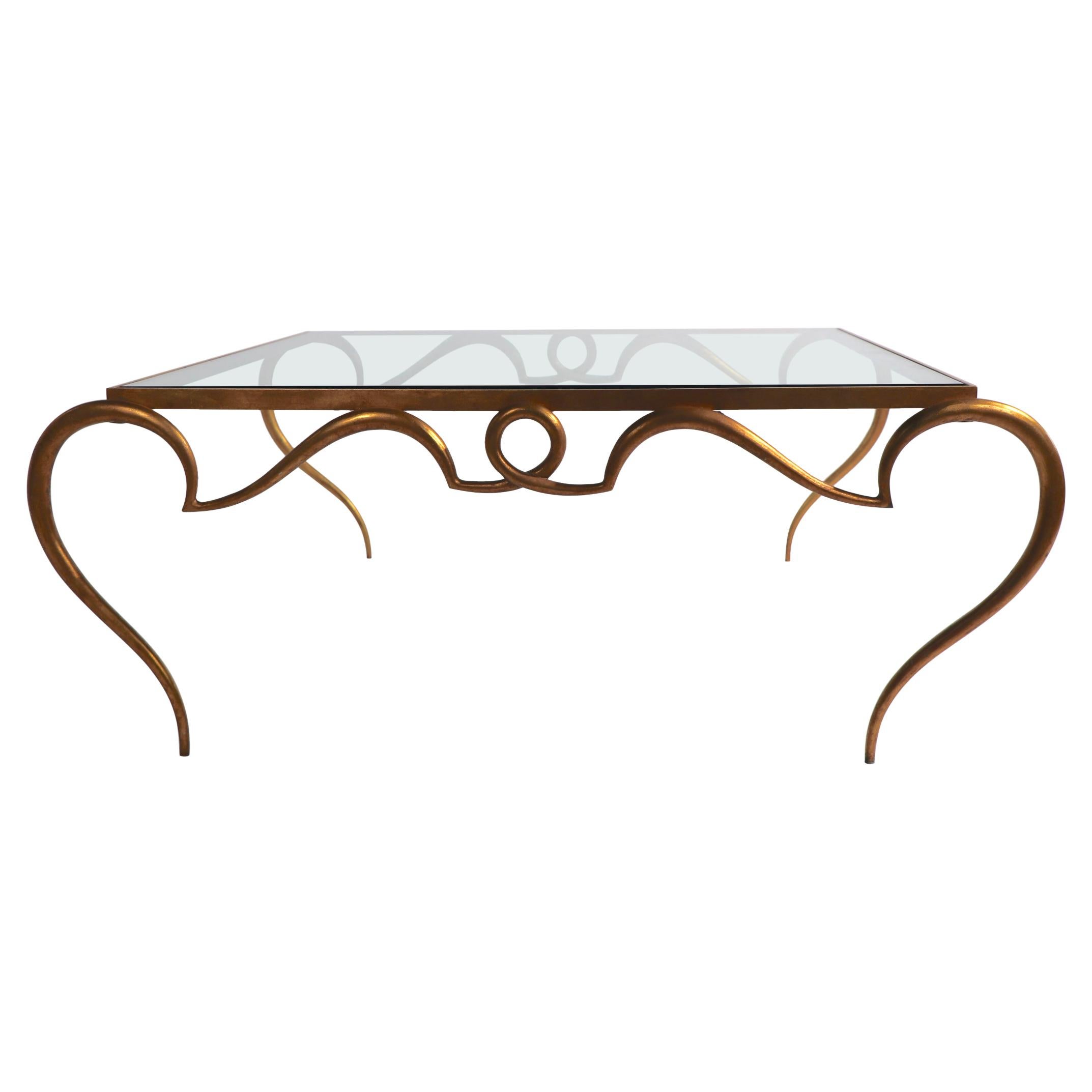 Faux Gilt Metal Scrollwork and Glass Coffee Table att. to Rene Drouet For Sale