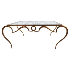Faux Gilt Metal Scrollwork and Glass Coffee Table