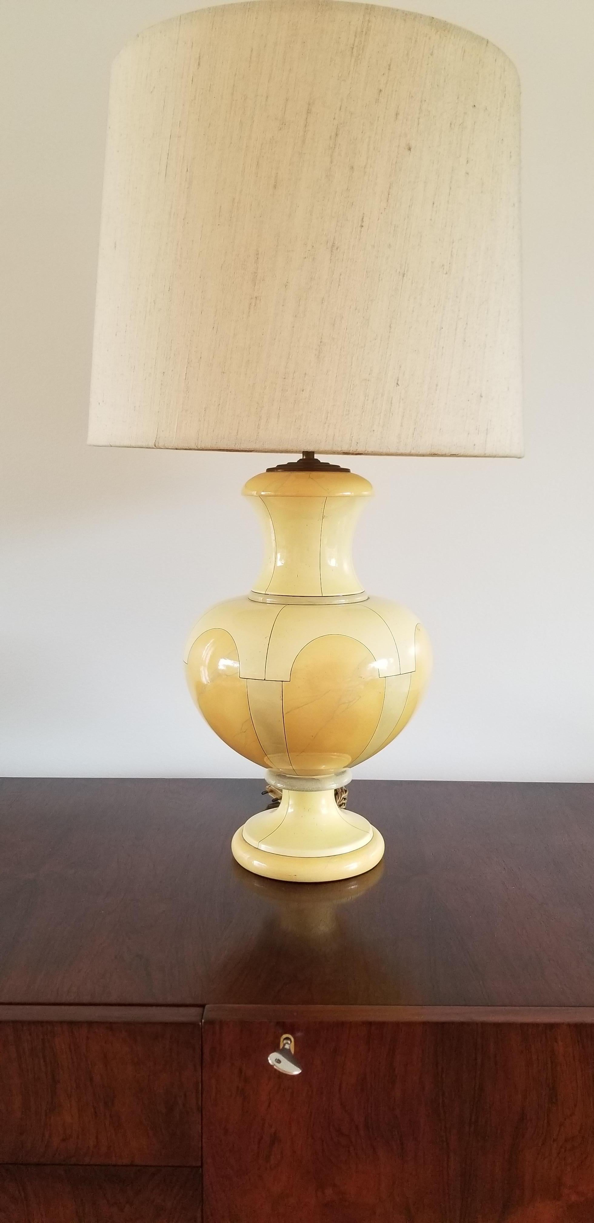 Elegant hand-painted ceramic lamp by Jean Roger
European socket and wiring
Minor quarter inch surface dent
This item will ship from Paris, France
Price does not include shipping and possible customs related charges
Sold without the shade
This