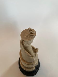 Faux Ivory Figure of Seated Empress