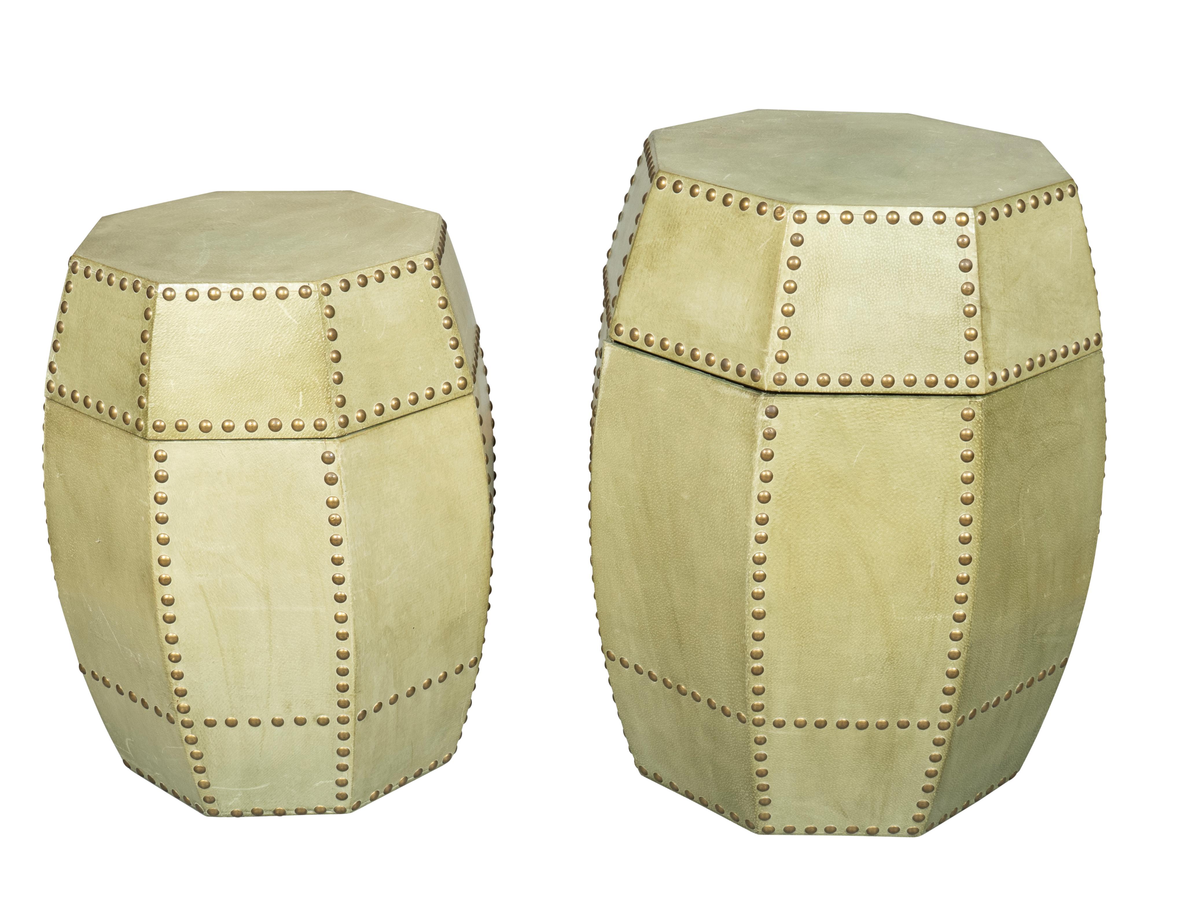 Pale green octagonal barrel with brass tacks within an inner smaller identical barrel.