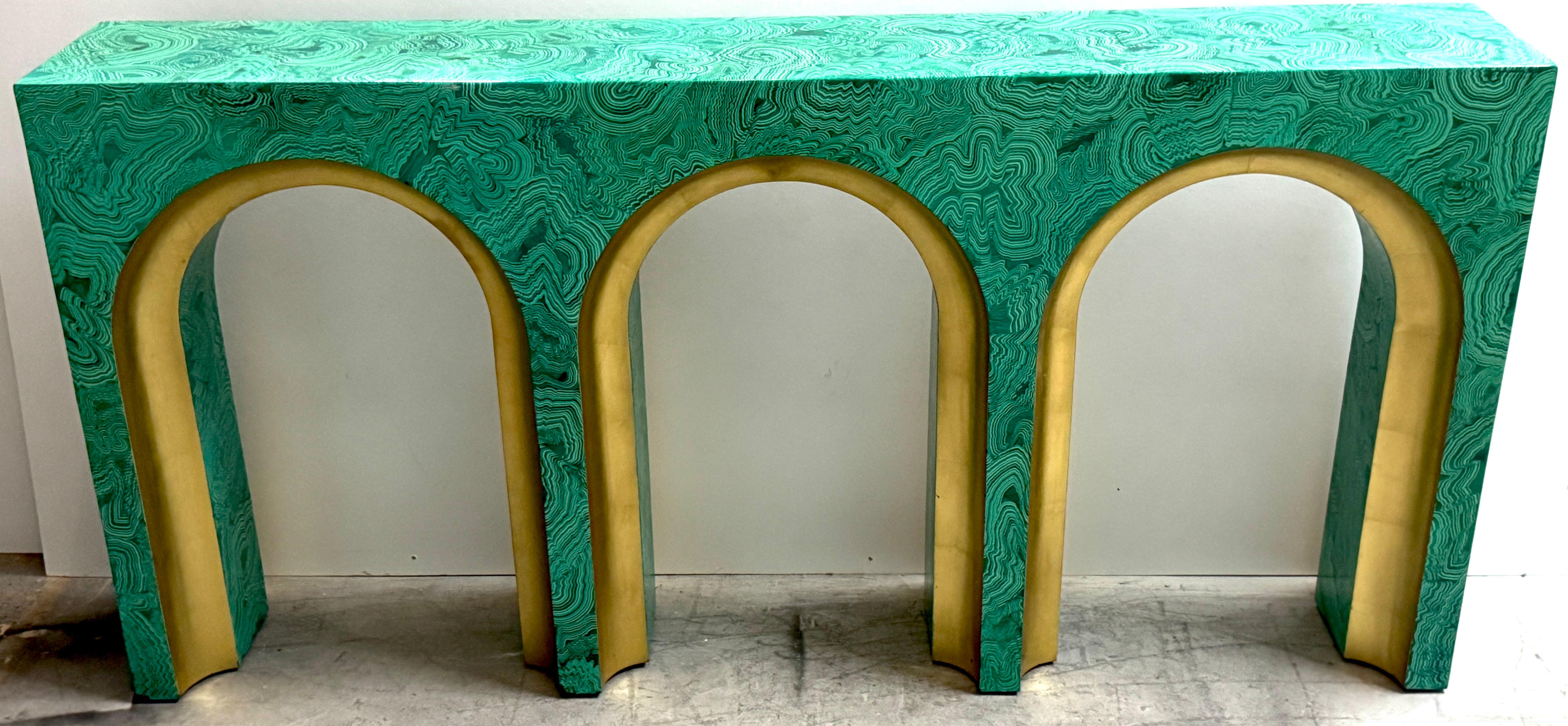 Faux Malachite and Gilt Arch Console Table in the Style of Tony Duquette – Sculptural, Fully Finished Design

A bold and sculpturally composed faux malachite console table in the style of iconic American designer Tony Duquette, known for his