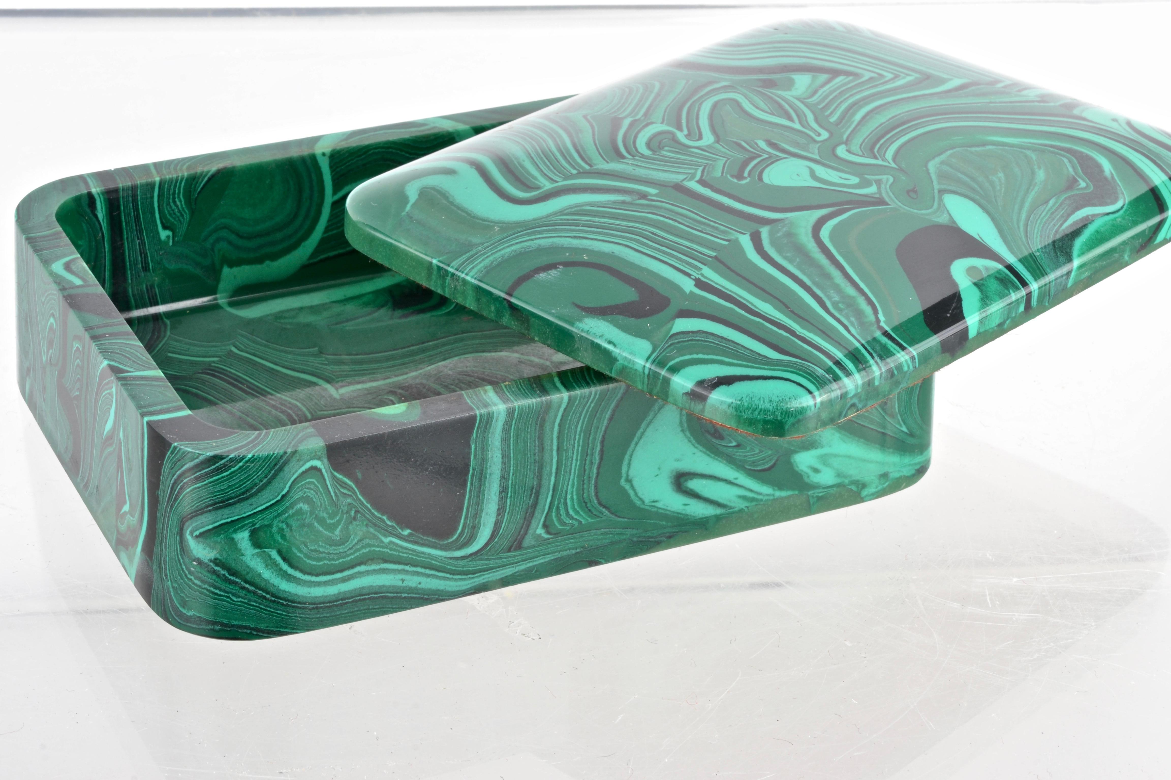High quality faux malachite box, made of a specialty composition. Heavy and pleasing to the touch. Malachite design continues inside the box. Great color.