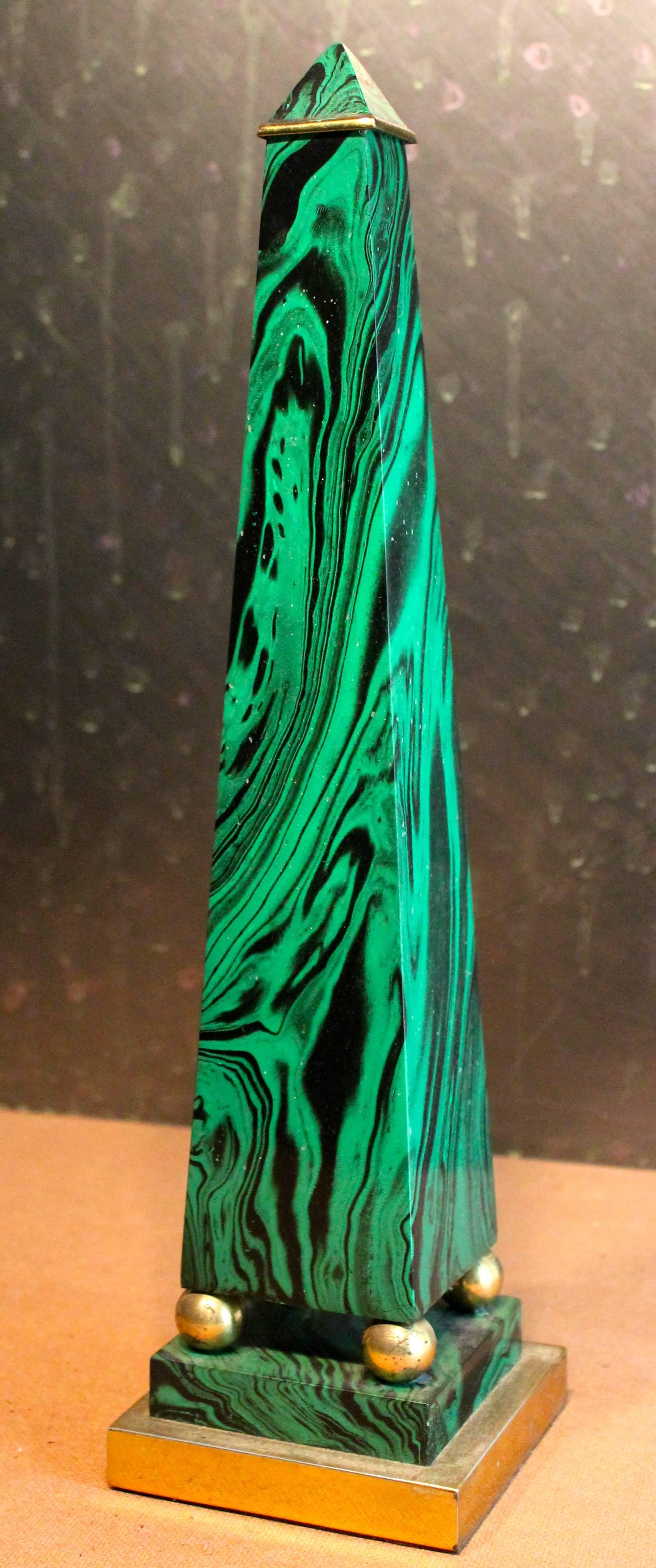 Faux malachite obelisk with brass detailing.