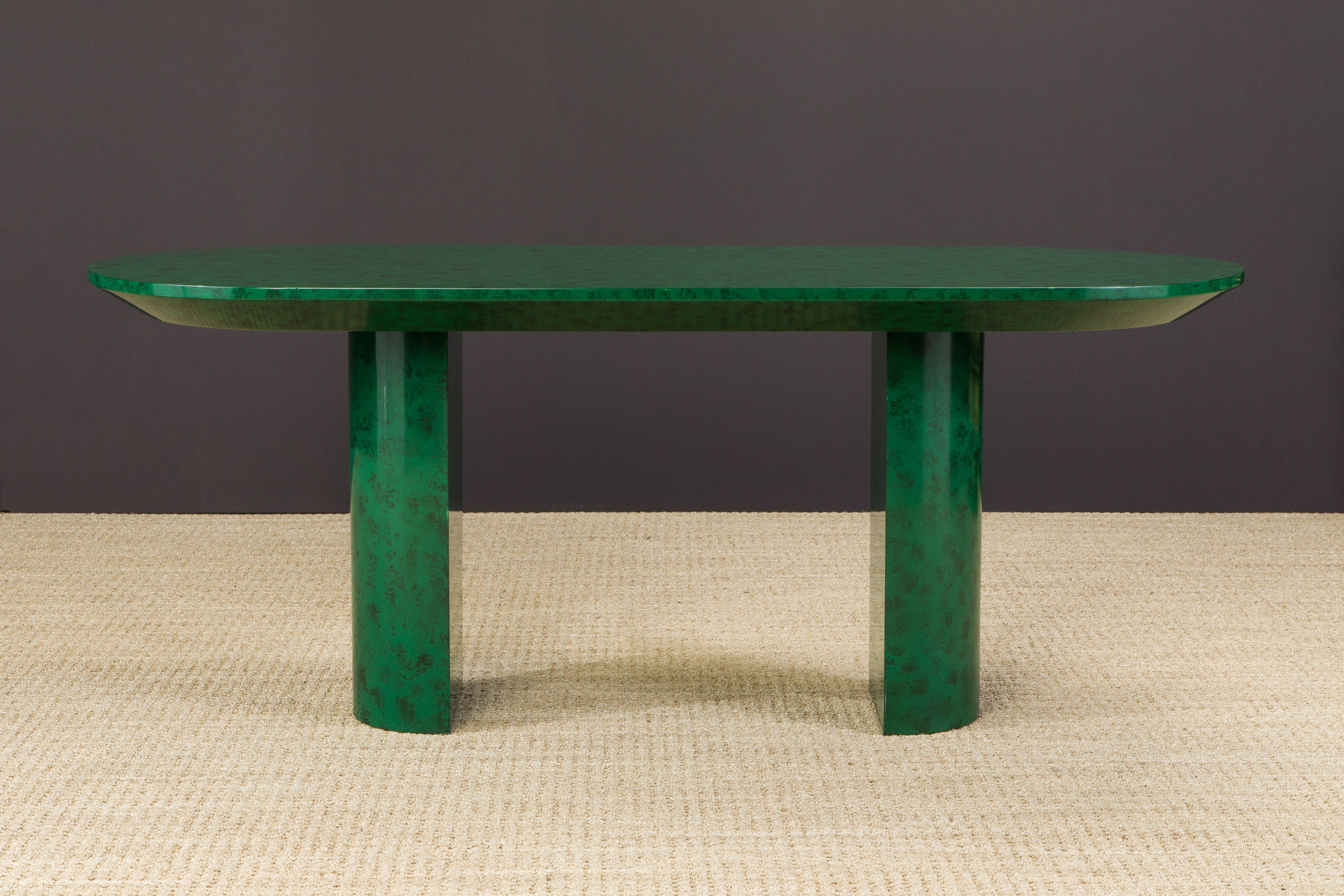 This beautiful Post-Modern faux malachite table is in an interesting size, can work as a small dining table, a deep sofa table, or a large console table - or consider this as a desk or work table. 

The deep speckled green color made to resemble