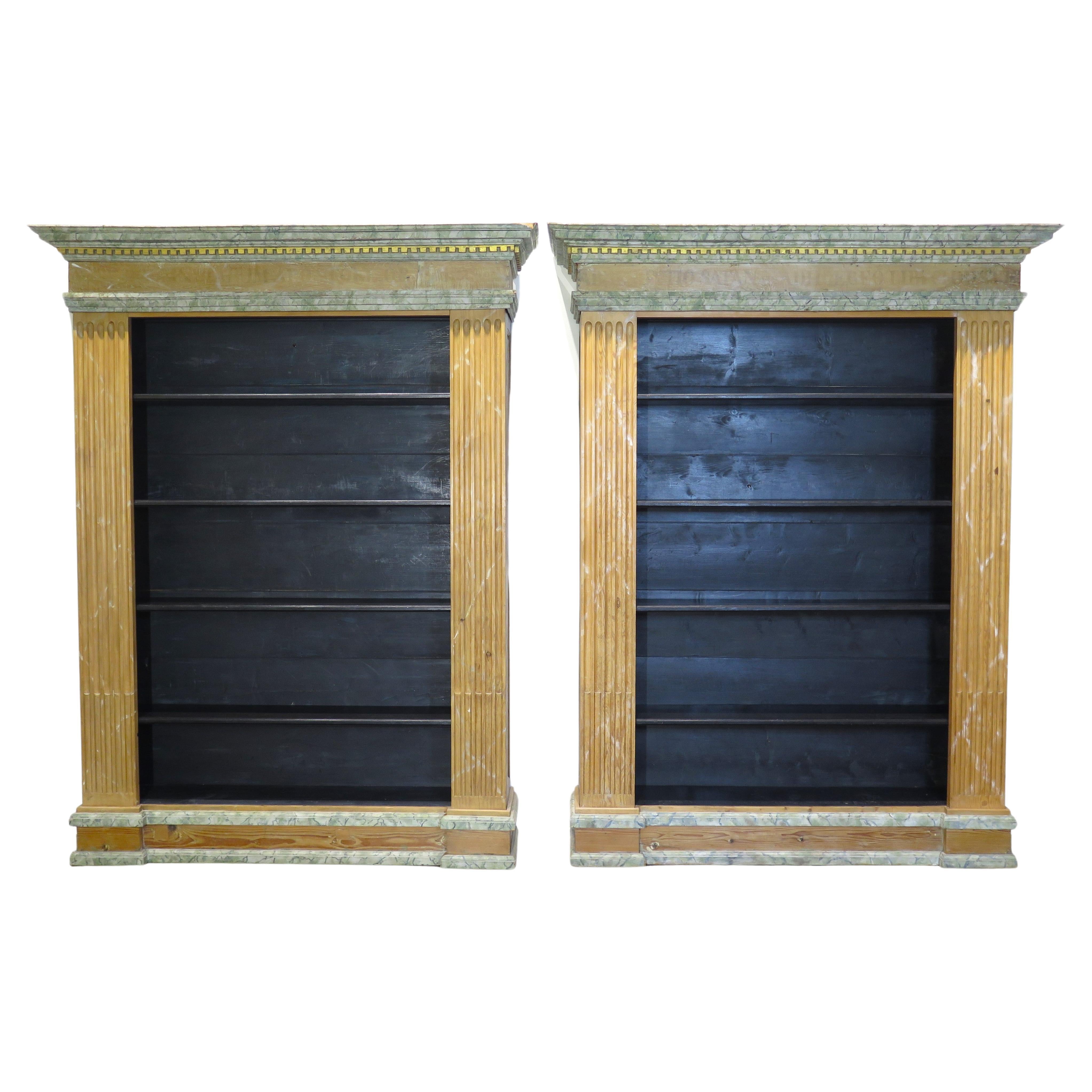 a paint (faux marble) and parcel gilt bookcase / cupboard / display shelves, central shelves flanked by handsome fluted pilasters, shaped cornice with dentil moldings, Italy, late 19th / early 20th century 

TWO AVAILABLE / price is per bookcase /
