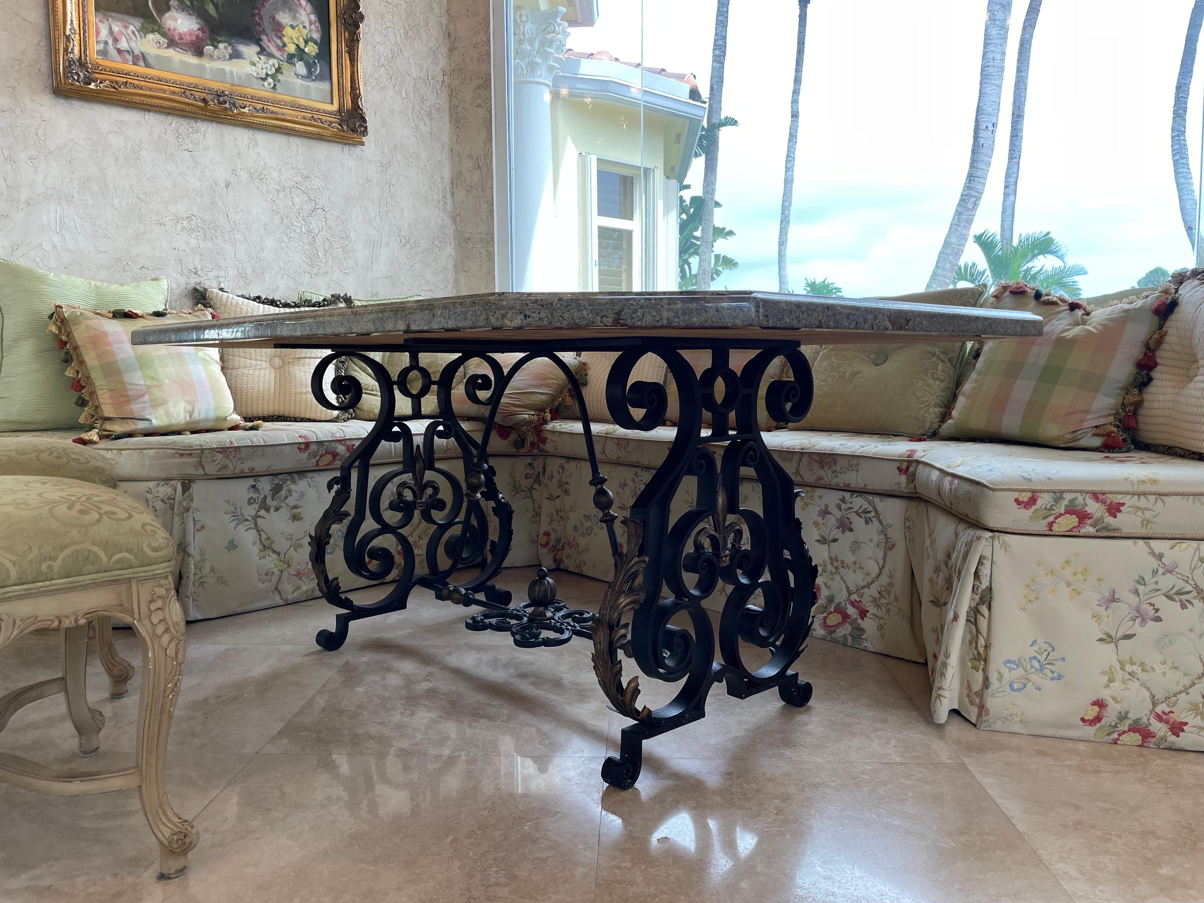 
Faux Marble and Wrought Iron Dining Table
The rectangular top with canted corners, on scrolled trestle supports fitted with gilt iron leaves and joined by stretchers.
Height 30 in. (76.2 cm.), Width 68 in. (172.72 cm.), Depth 48 in. (121.92 cm.)

