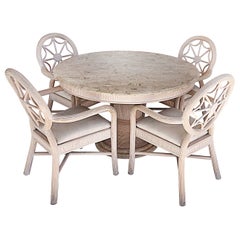 Ensemble de chaises en roseau de style Crespi et table en pierre tessellée