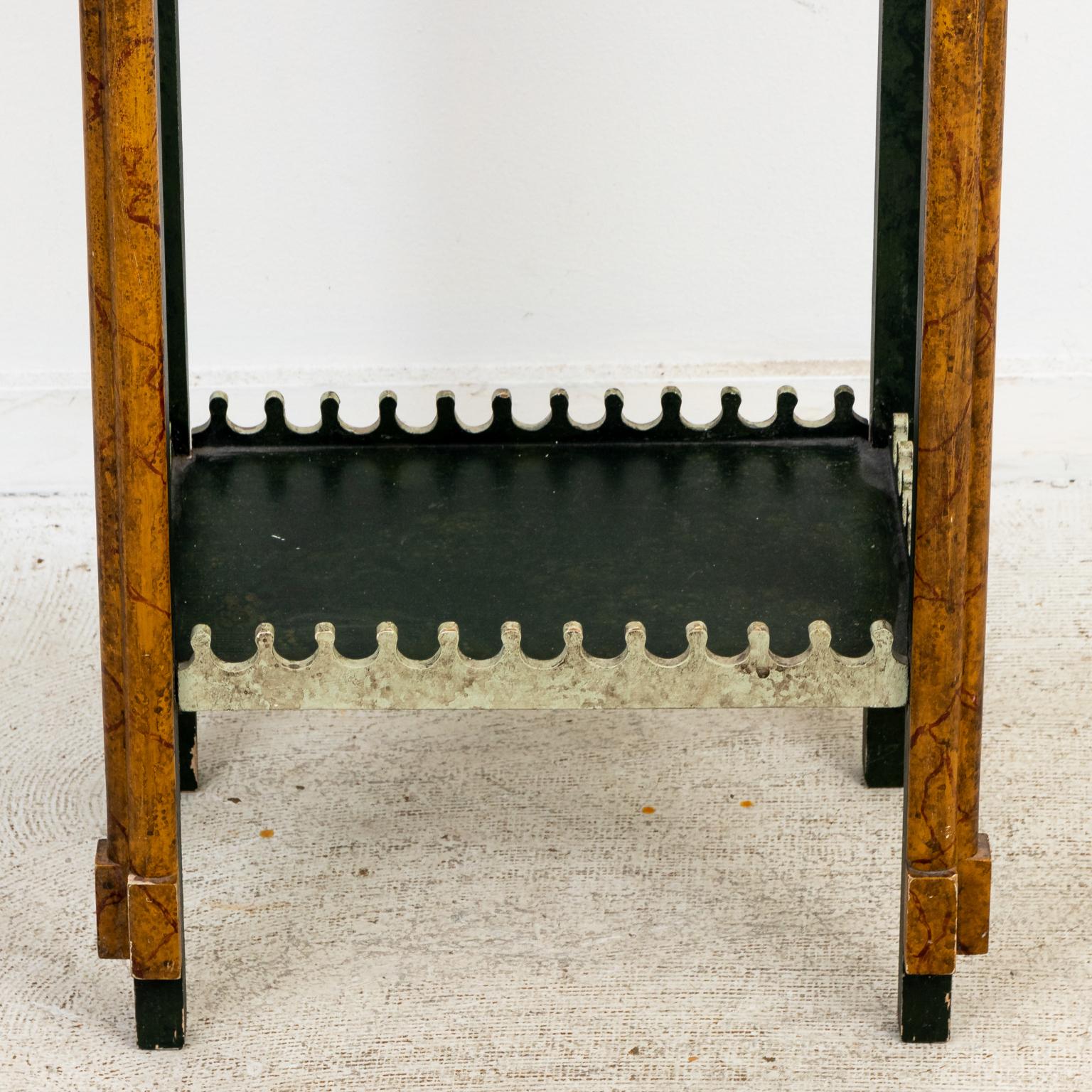 Circa 1990s faux painted Gothic style bird cage with pointed arches, trefoil tracery, and bottom shelf. Origin unknown. Please note of wear consistent with age.