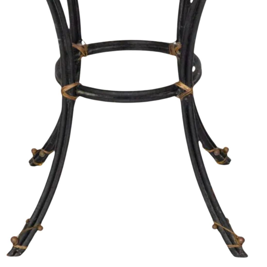 This Faux Painted Marble Top Iron Table combines elegant craftsmanship with timeless design. The tabletop is expertly crafted with a faux marble finish, imitating the luxurious look of real marble while being lightweight and durable. The sturdy iron
