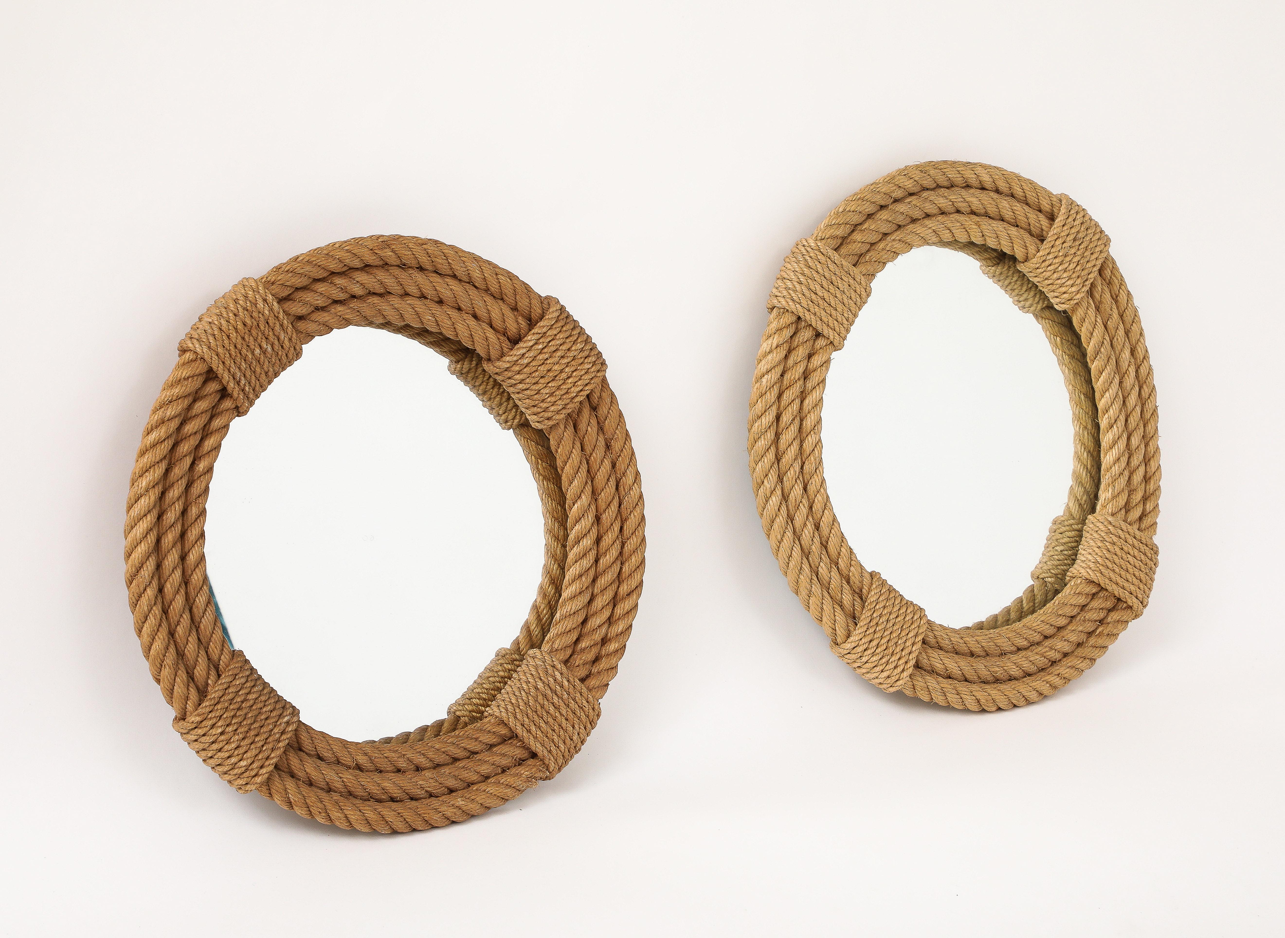 French Riviera icon designers duo Adrien Audoux & Frida Minnet faux pair of rope wall mirrors.
Slight different in rope tone.
1 inch diameter difference.