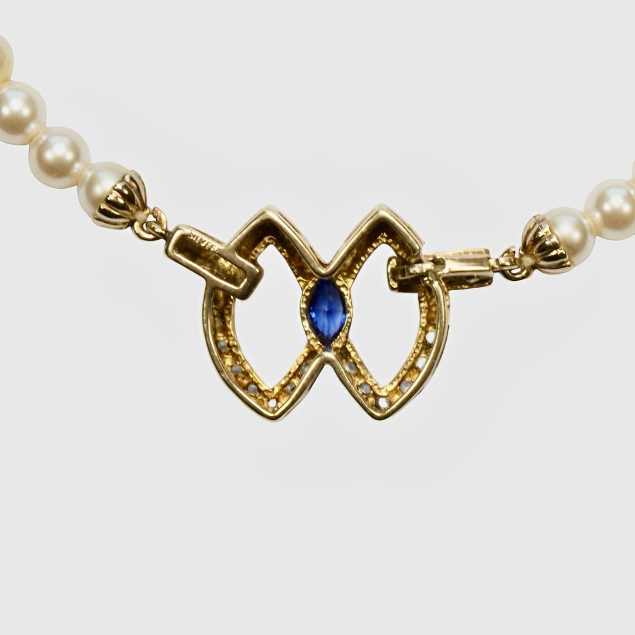 Faux Pearl Necklace with a Blue Stone, Silver and Gold Wash Pendant Clasp For Sale 2