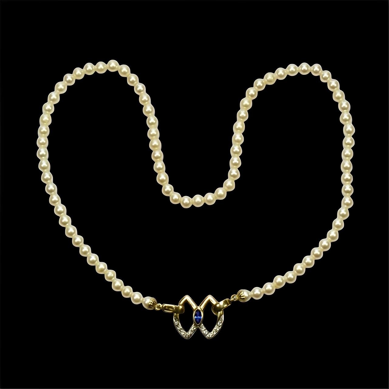 Faux Pearl Necklace with a Blue Stone, Silver and Gold Wash Pendant Clasp For Sale 5