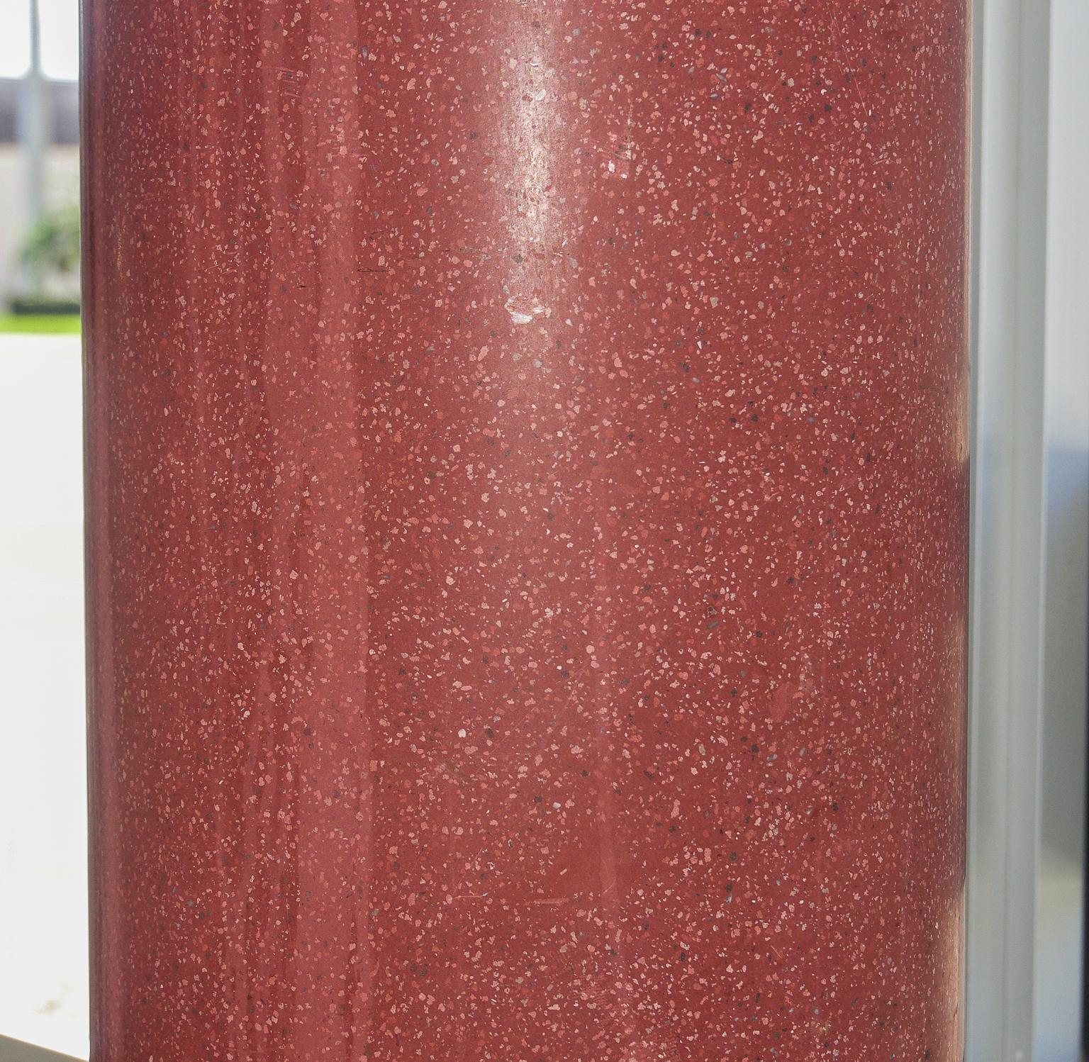 This stylish and chic faux porphyry pedestal was acquired from a Palm Beach estate and was originally purchased in London, England in the 1920s-1930s. 

