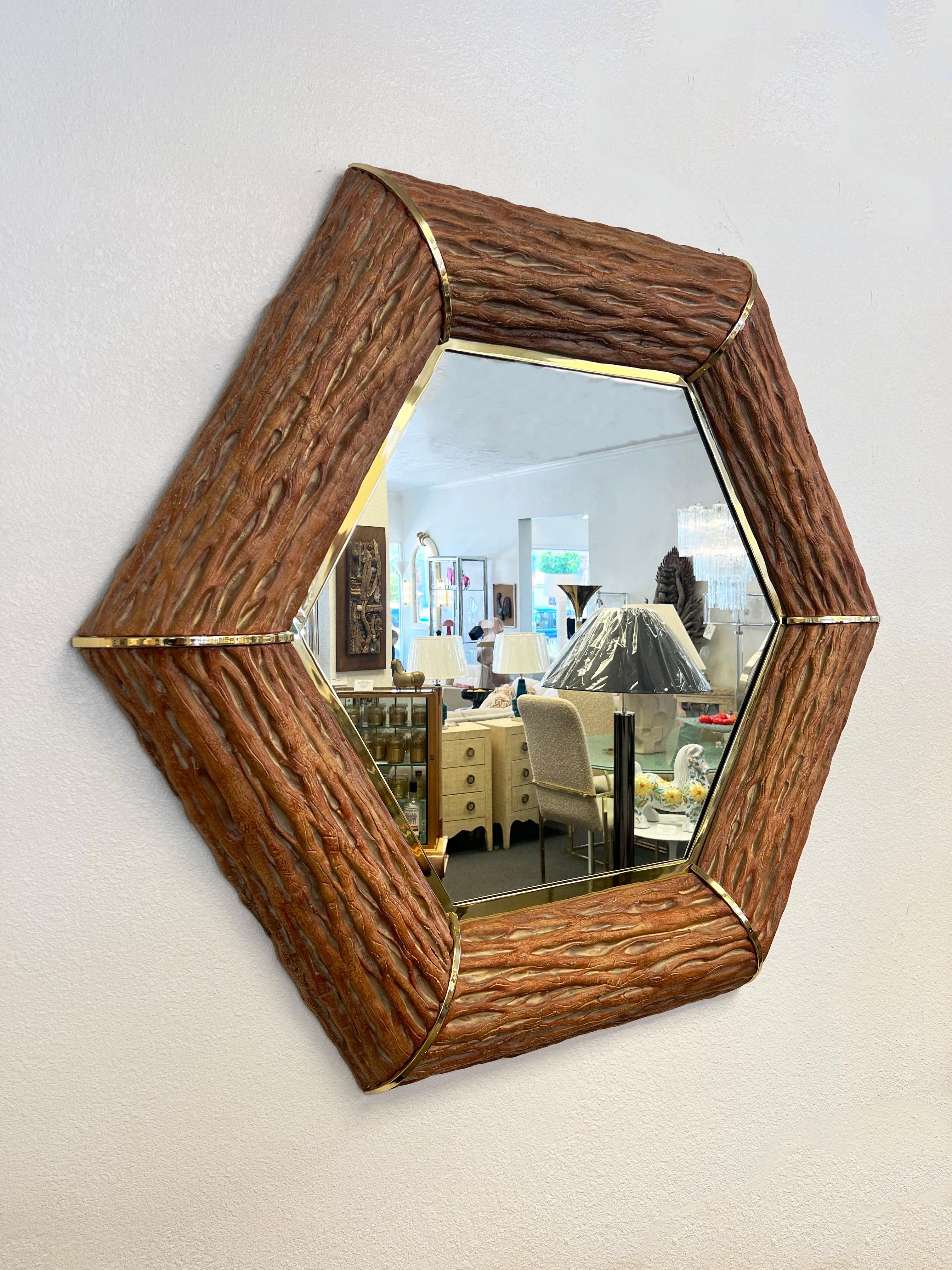 1980’s hexagonal shape faux Saguaro and polish brass wall mirror. 
Out of a Steve Chase design estate. 
Constructed of solid brass and fiberglass that’s hand painted. 

In greater vintage condition, minor wear consistent with age. 

Measurements: