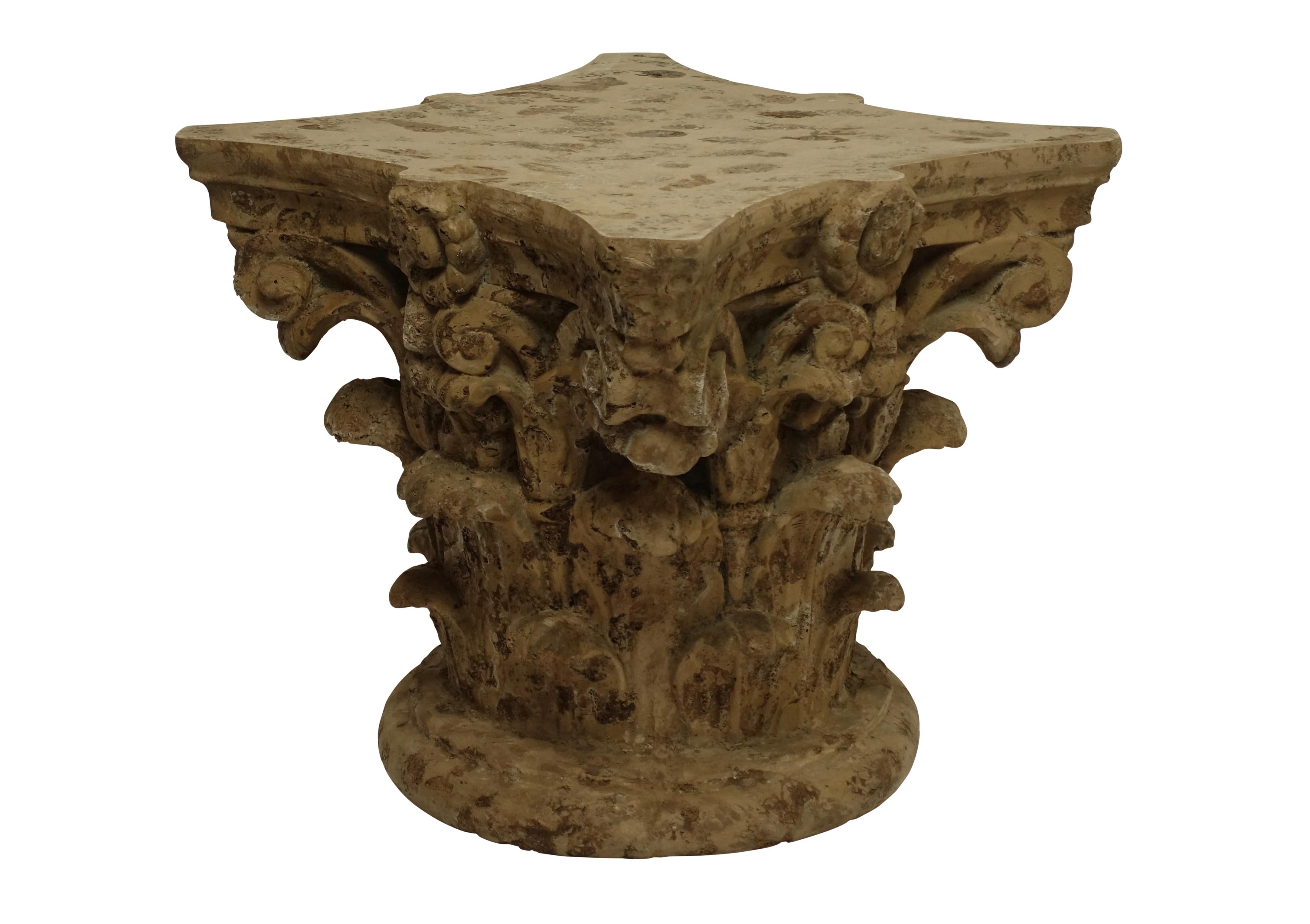 This low table is made of molded fiberglass and painted to look like the ruins of an ancient capital from a Corinthian/Ionic mix column, in the manner of a Michael Taylor design. American, mid to late 20th century. 
There are two available, sold