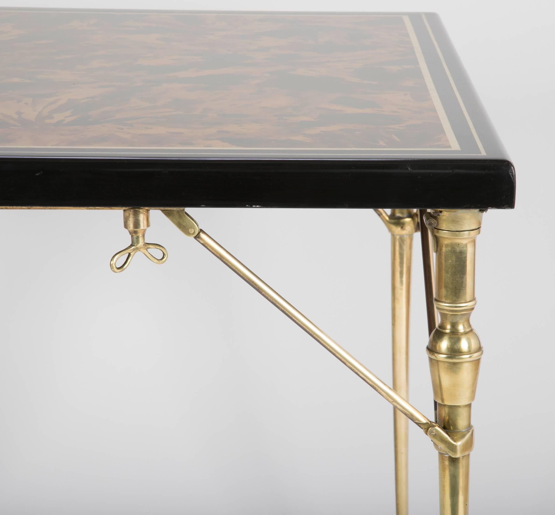 Italian Faux Tortoise Shell Black Lacquer and Gilt Games Table with Bronze Folding Legs