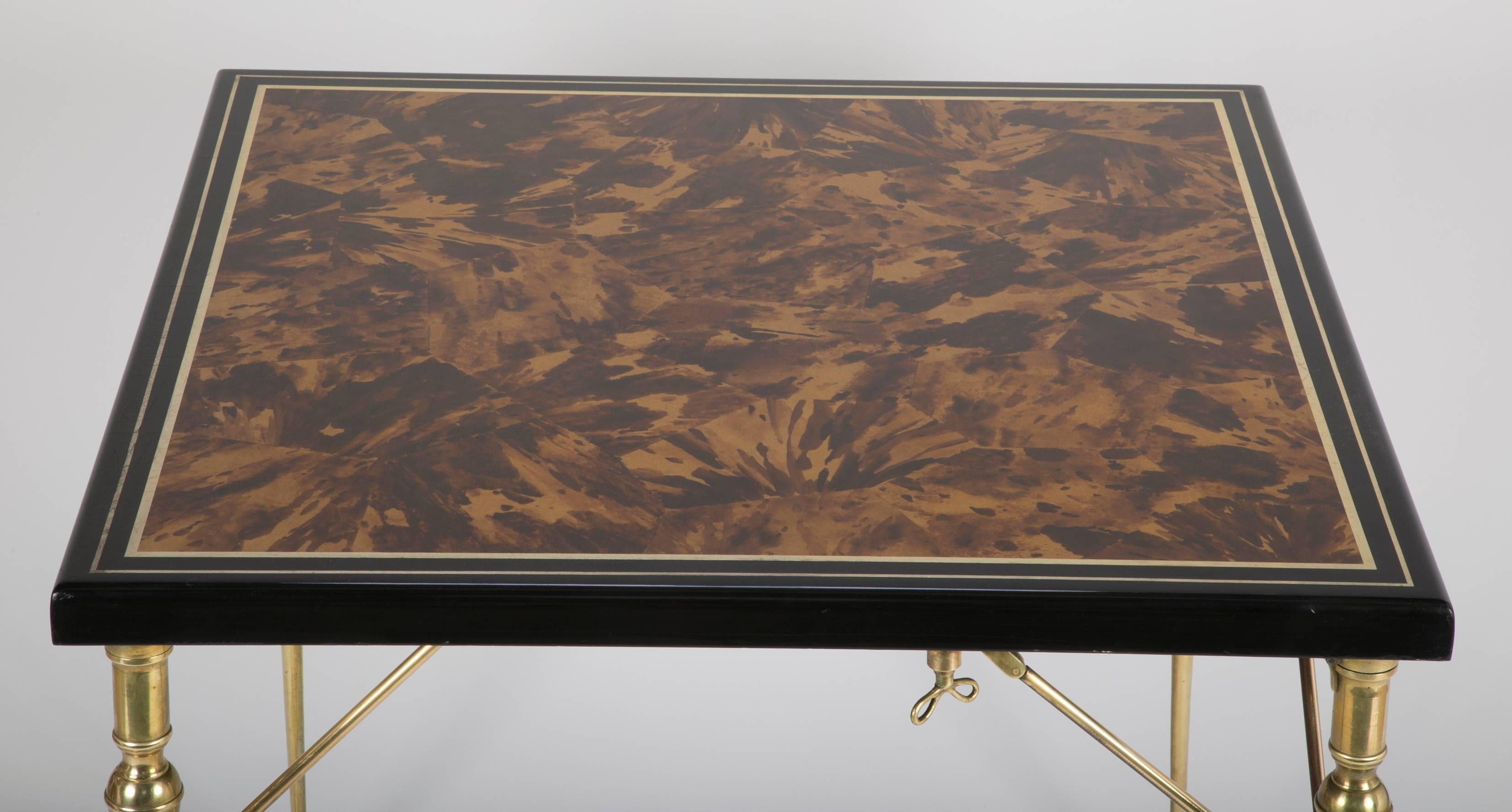 Faux Tortoise Shell Black Lacquer and Gilt Games Table with Bronze Folding Legs In Excellent Condition In Stamford, CT