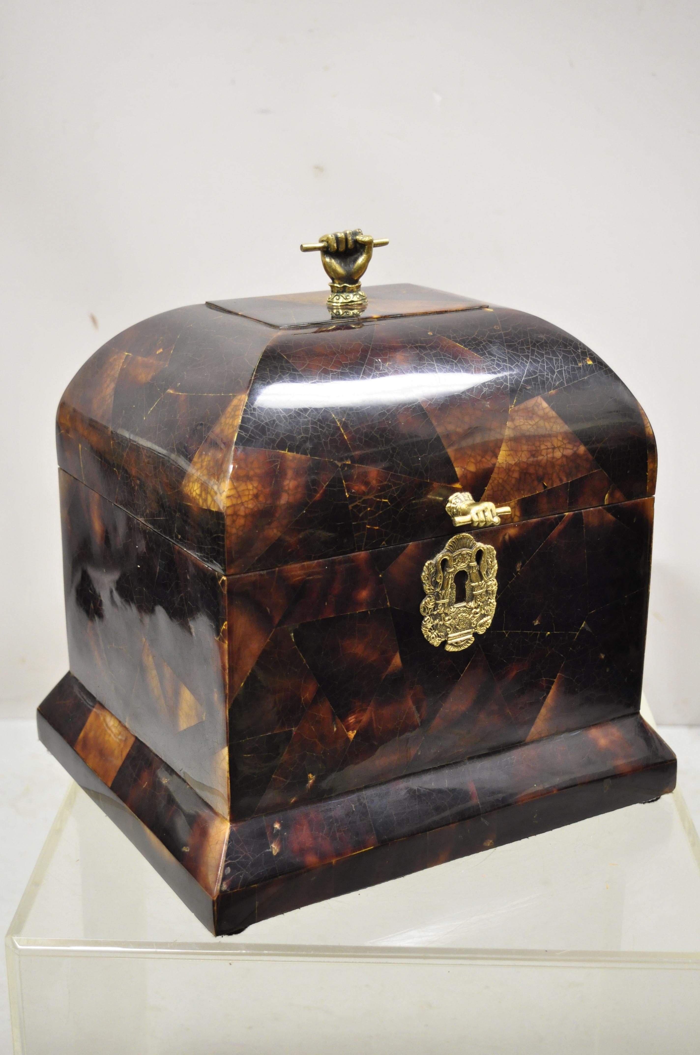 Faux tortoise shell brass hands hinge lid box after Maitland Smith. Item features brass hand figures, faux tortoise shell case, hinge lid, very nice vintage item, quality craftsmanship, great style and form. Maker unconfirmed. Possibly Maitland