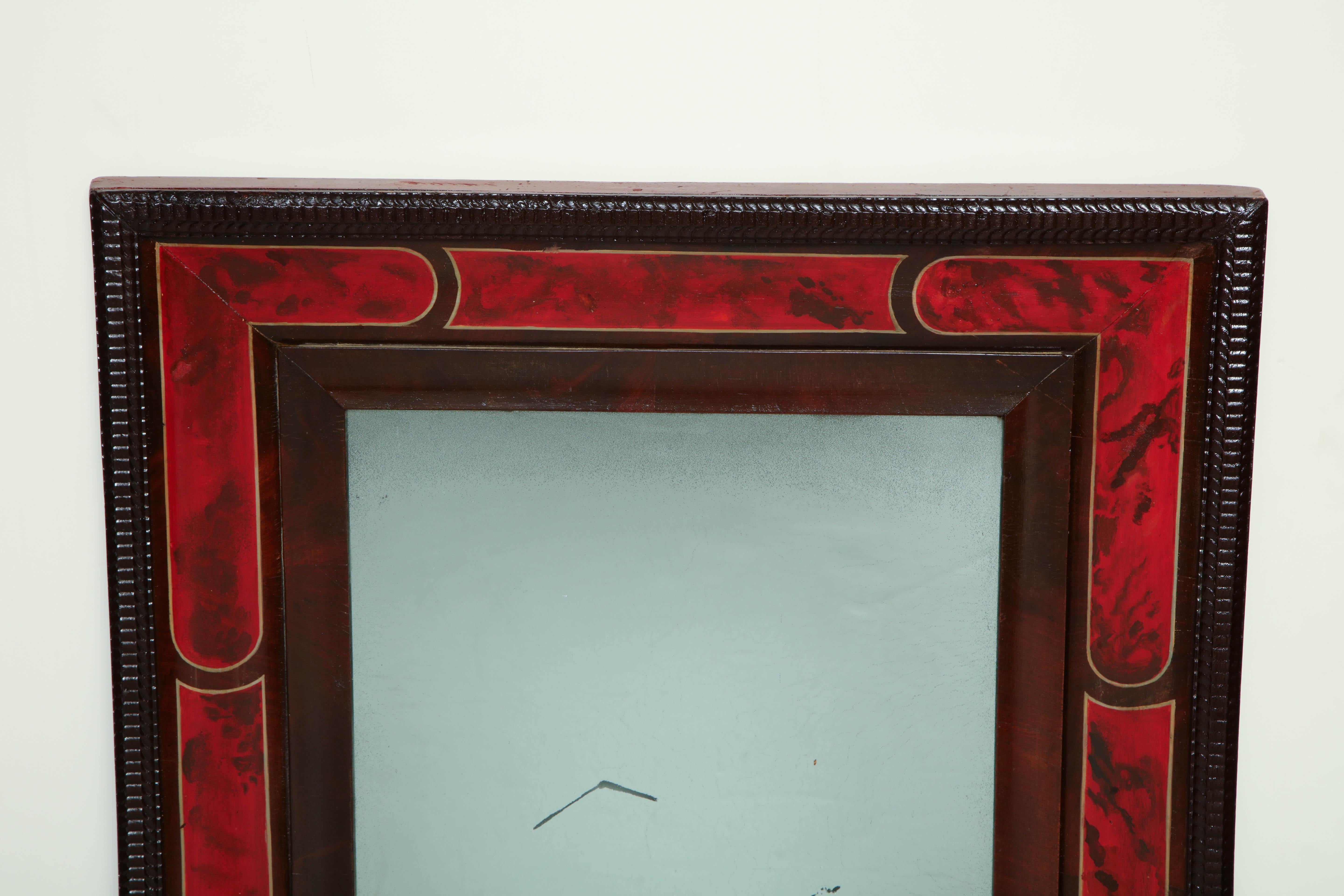 19th century English ribbon carved and faux tortoise shell painted mirror.