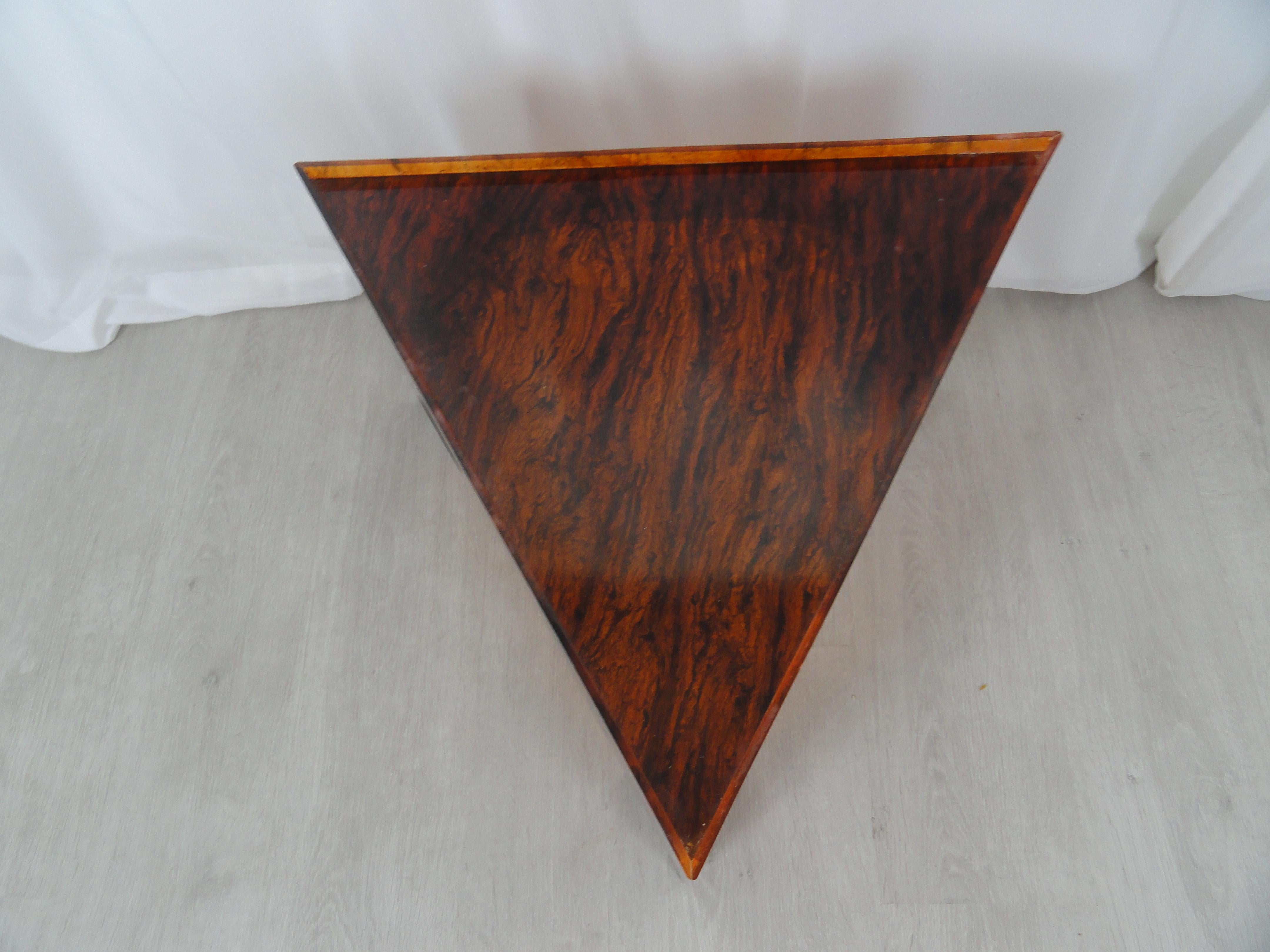 Faux tortoiseshell acrylic triangle table. Measures 15