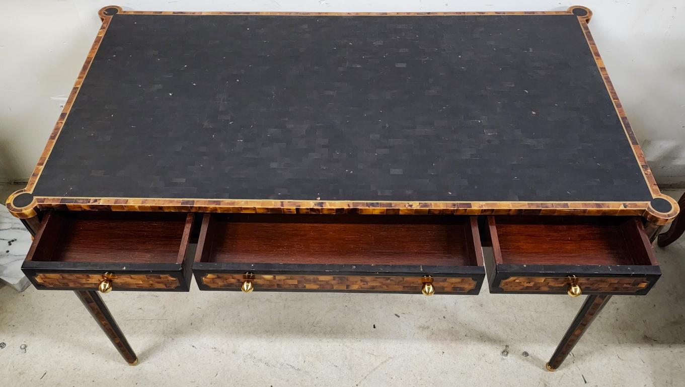 For FULL item description be sure to click on CONTINUE READING at the bottom of this listing.

Offering one of our recent palm beach estate fine furniture acquisitions of a 
1980s Faux Tortoiseshell Desk by Maitland-Smith

Desk is finished on