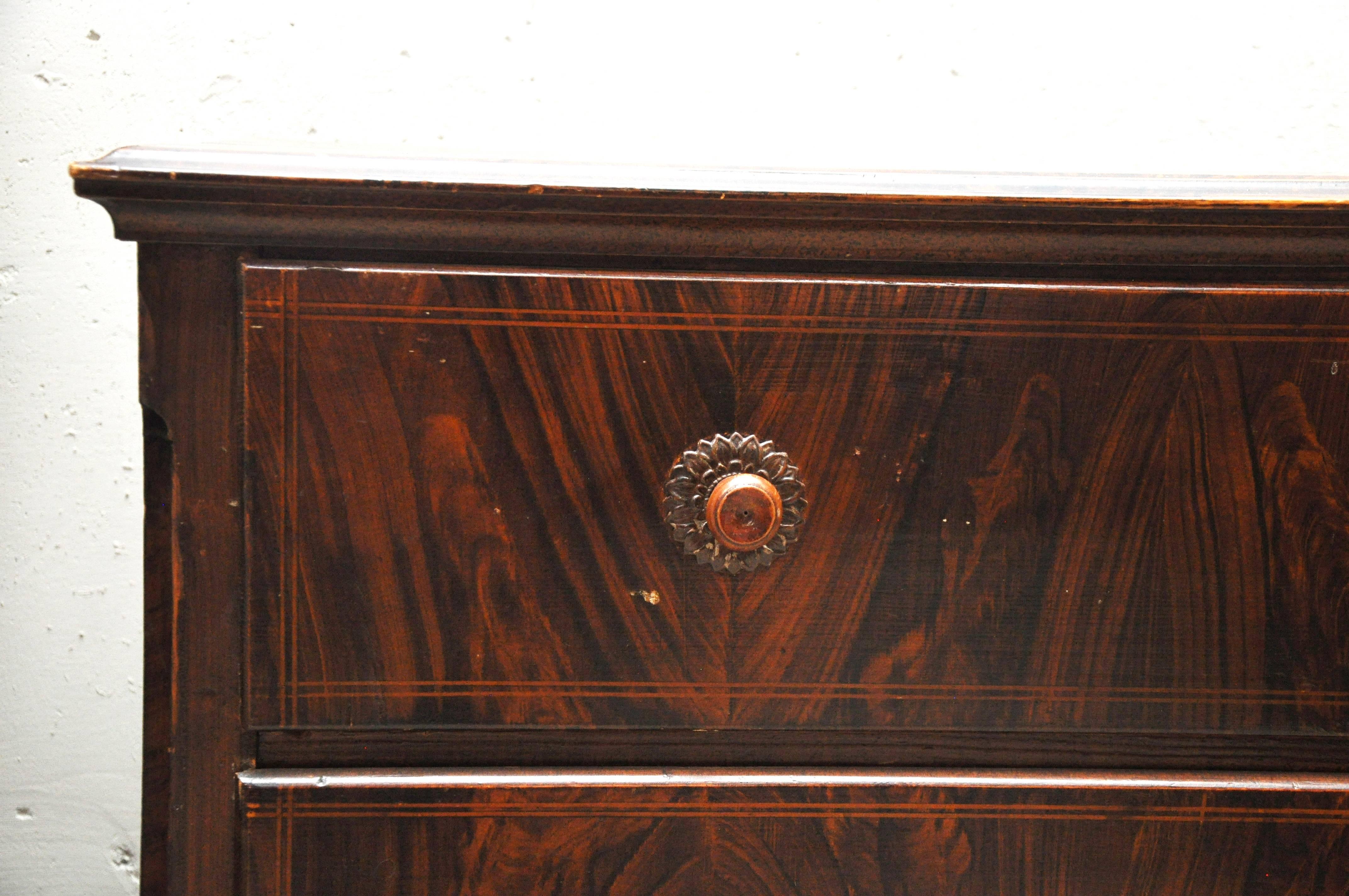 Excellent example of fine faux wood graining on the lovely chest of drawers.