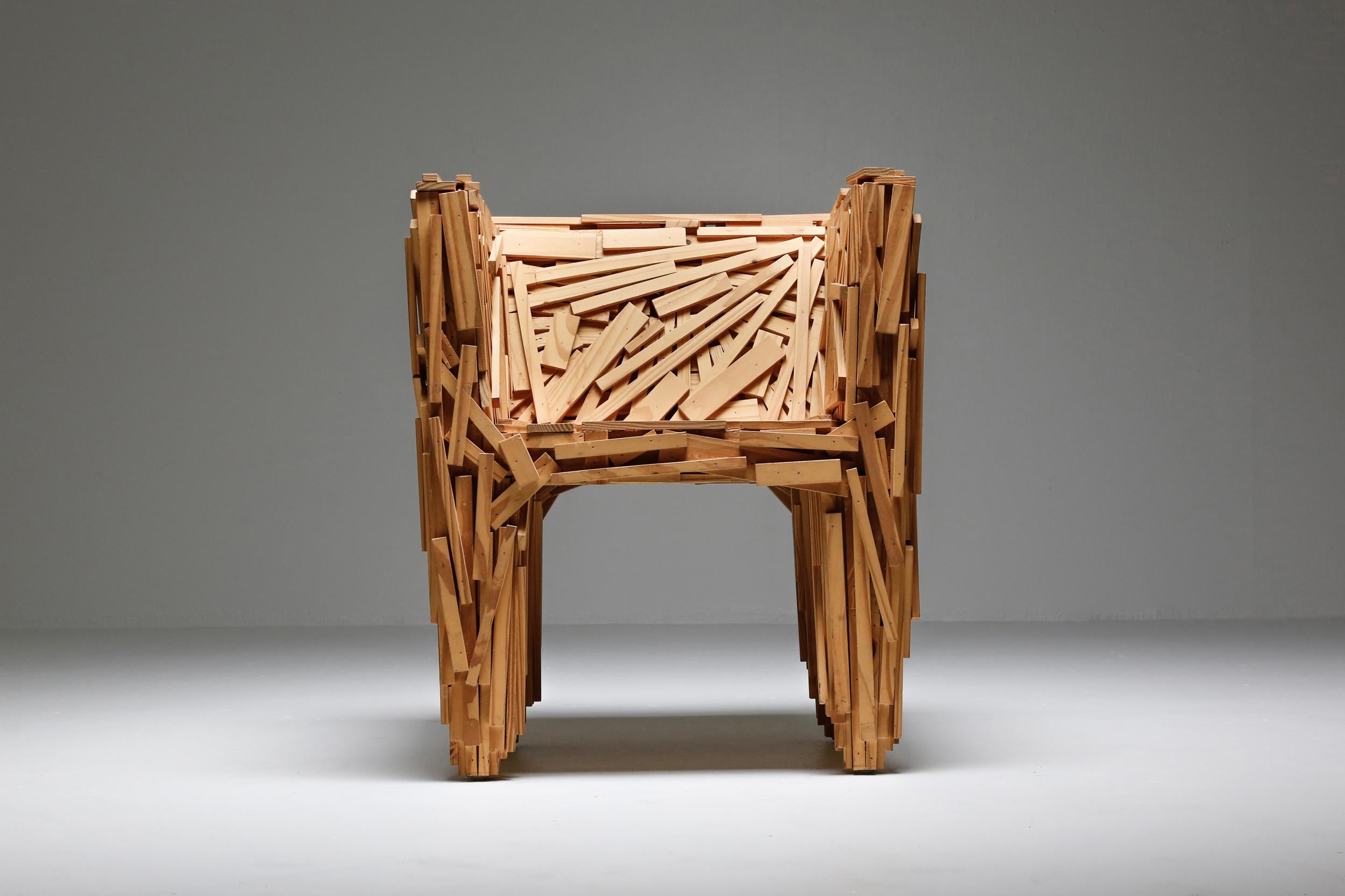 Estudio Campana, Edra, Favela chair, Italy,

Without any internal frame, Favela is made with many strips of natural wood,
Pine for indoor use, teak also for outdoor. In both cases, the strips are nailed one over the other by hand, in a random