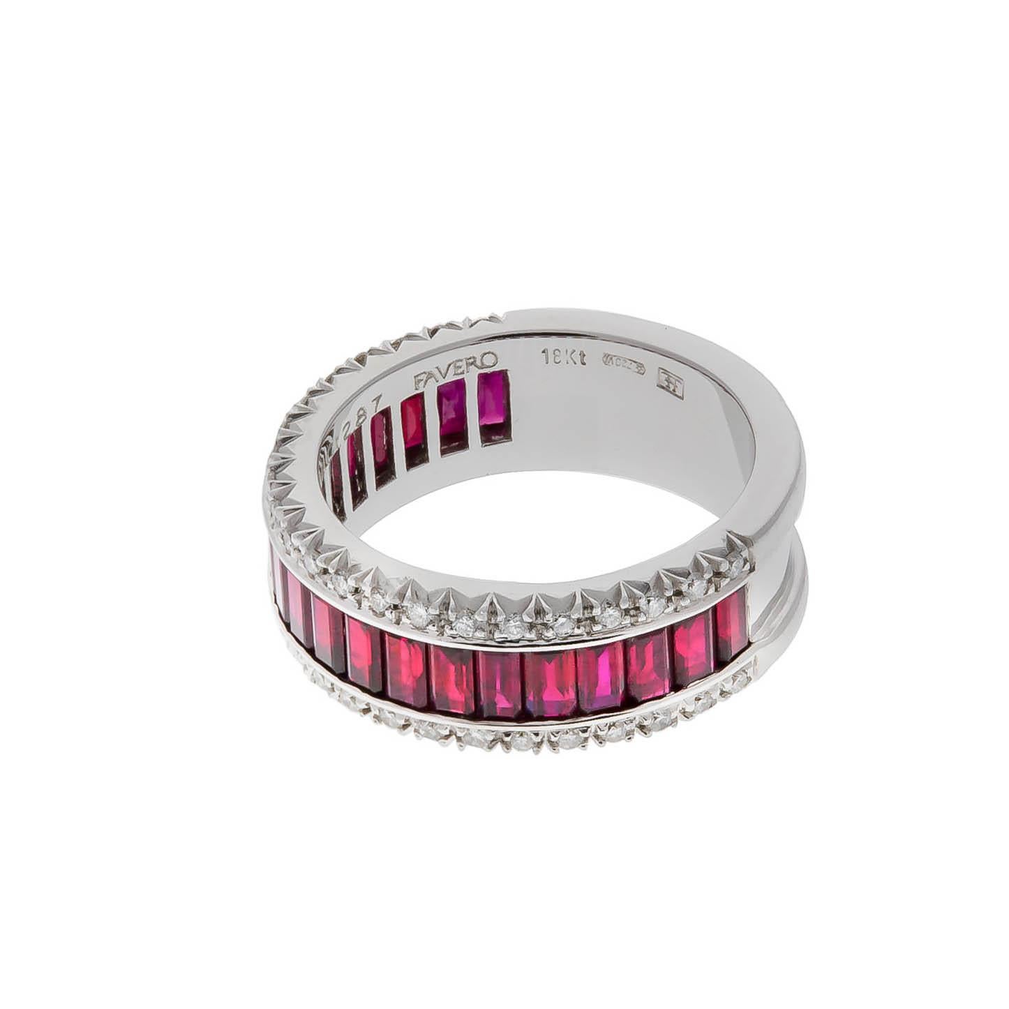 Favero 18K white gold band containing emerald cut rubies weighing combined 2.87 carats and round diamonds weighing combined 0.30 carat.
Size 6 1/2. Can be sized.