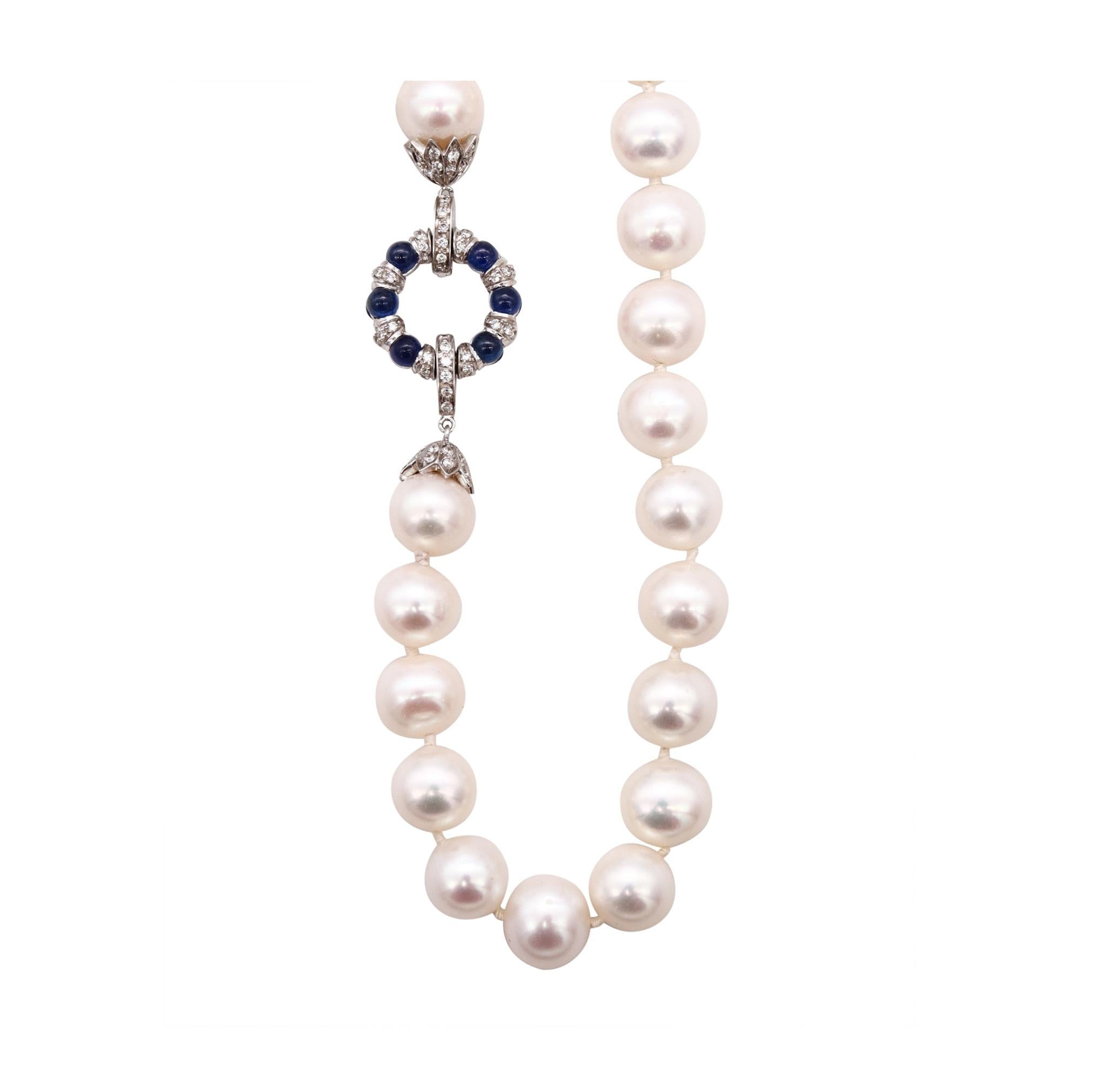 An Akoya pearls necklace designed by Favero.

Gorgeous necklace made in Italy by the jewelry house of Favero. It was crafted in solid white gold and Akoya pearls of 10 mm .

The lock is mount, with 12 round cabochon cut of natural Ceylon blue