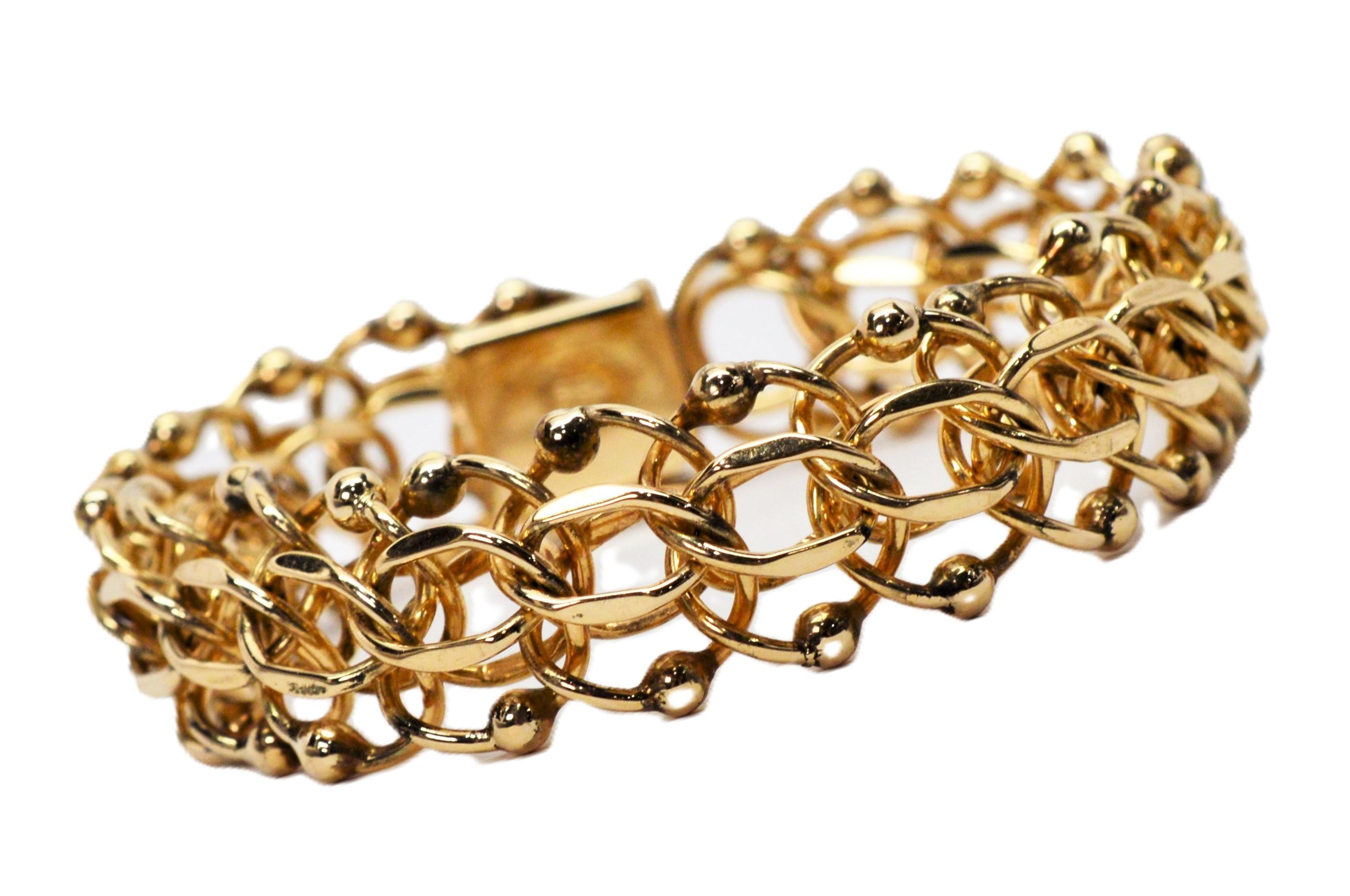 You will find any excuse to wear this fine quality and stylish 14 karat gold bracelet each and every day. So very versatile, this substantial gold bracelet will boost any look as an accessory with its bright eye catching three dimensional
