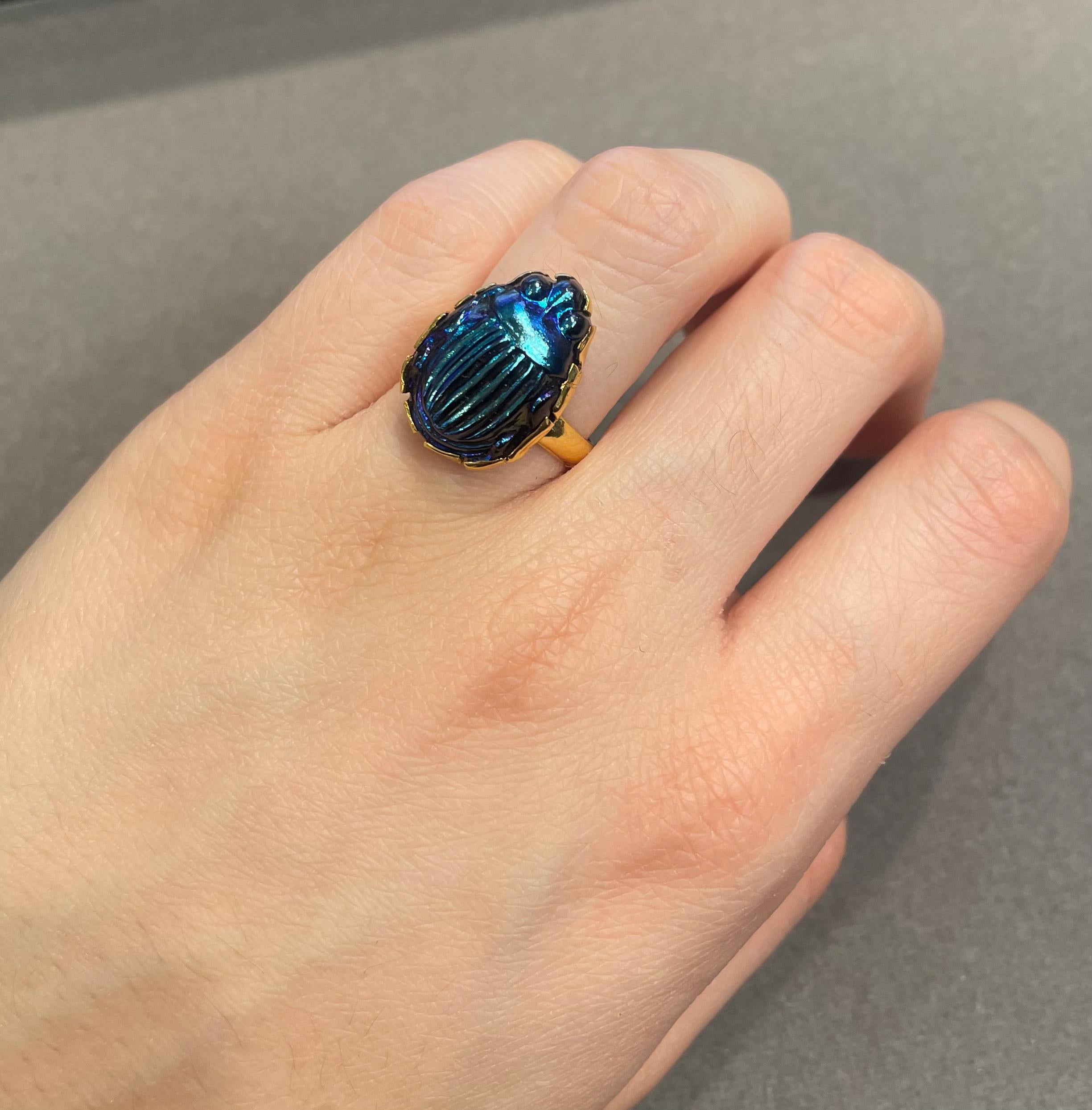 Favrile Glass Scarab Ring

A favrile glass ring featuring a scarab beetle.

Ring Size: 5.5
Complimentary resizing 
Metal Type: 14 karat gold 
