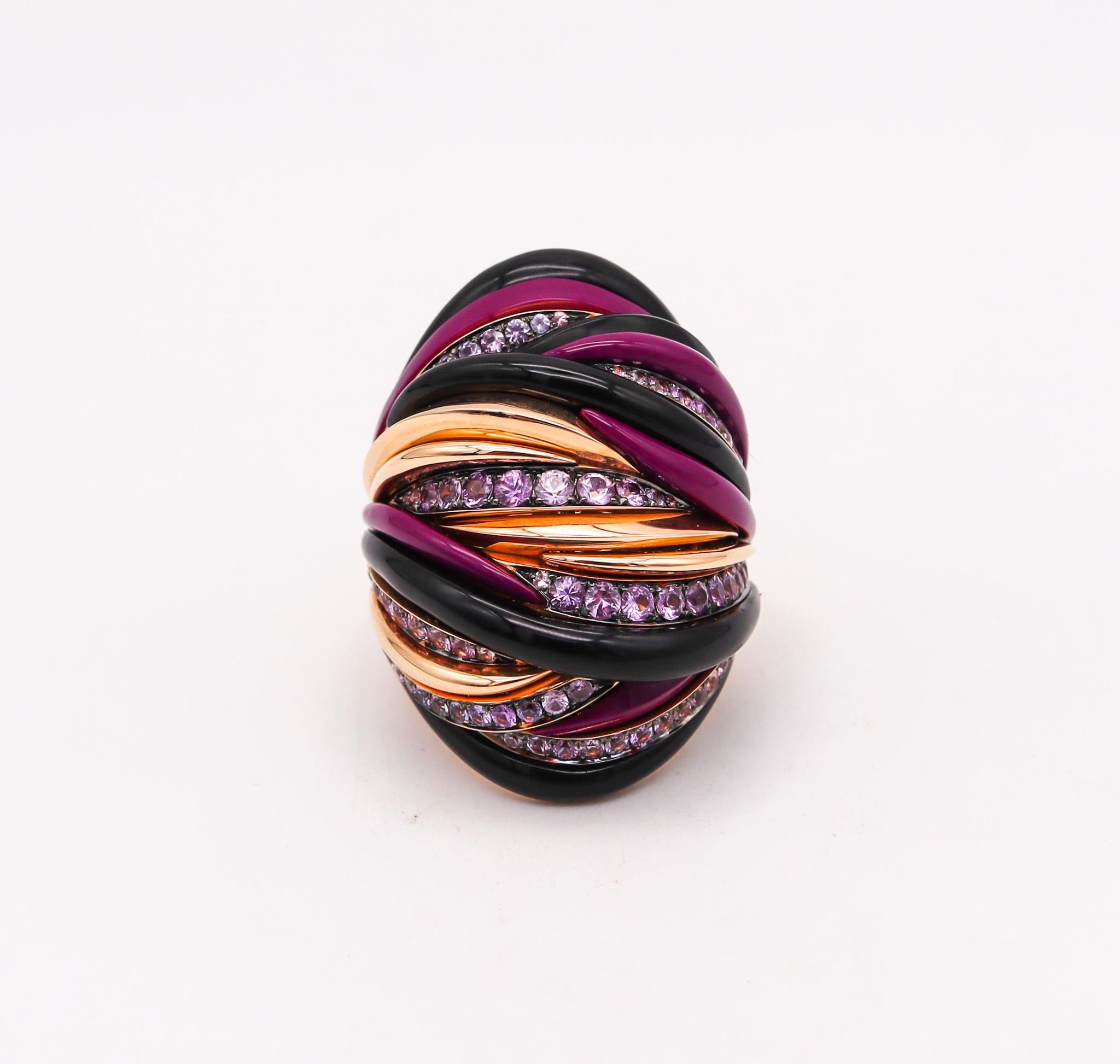 Sculptural cocktail ring designed by Fawaz Gruosi. 

Fabulous contemporary cocktail ring, created in London England by the famed jewelry designer Fawaz Gruosi. This colorful ring has been crafted as a free form sculpture in solid yellow gold of 18