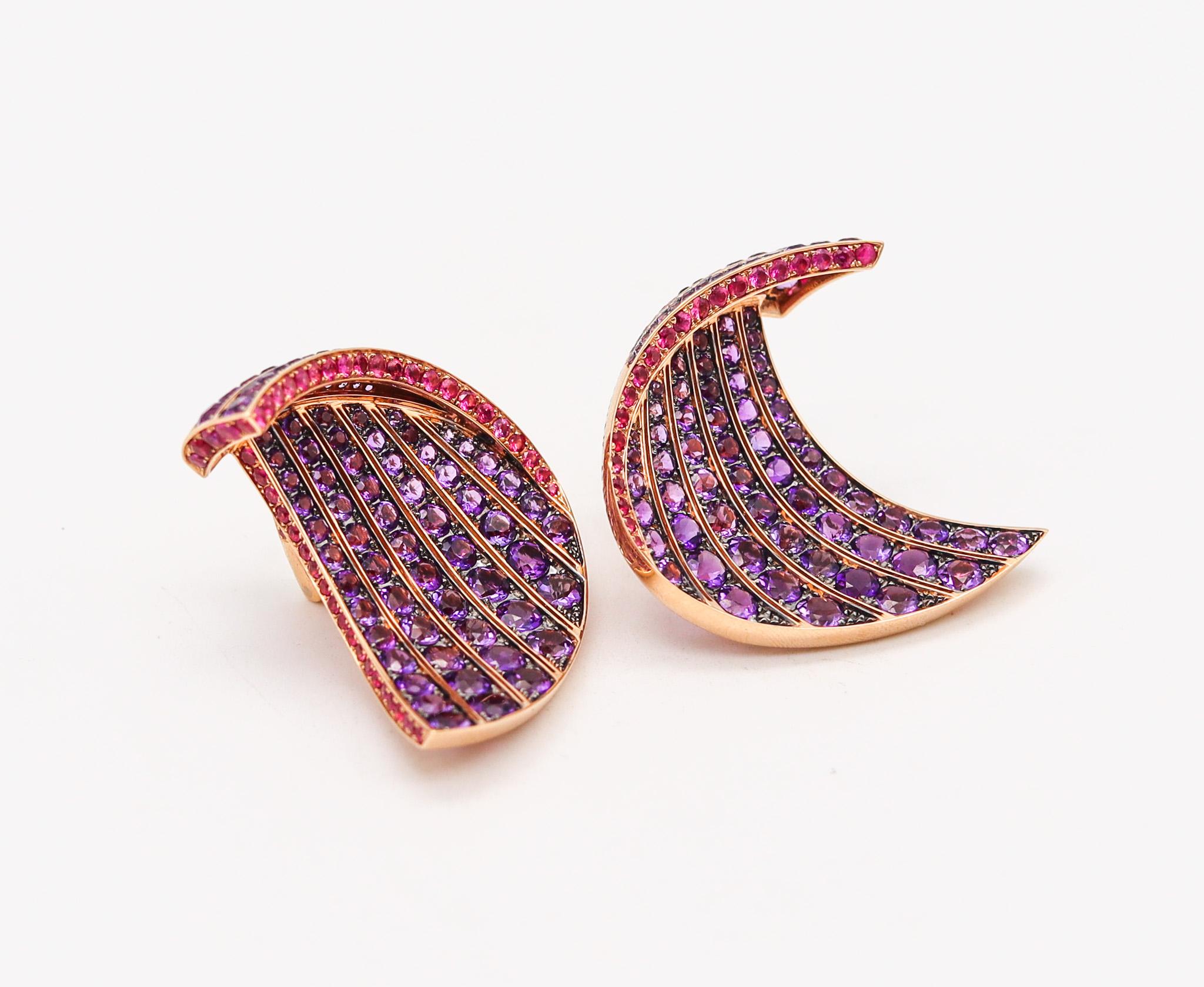 Sculptural earrings designed by Fawaz Gruosi. 

Fabulous contemporary pair of earrings, created in London England by the famed jewelry designer Fawaz Gruosi. These colorful earrings has been crafted in the shape of a free form wave in solid yellow