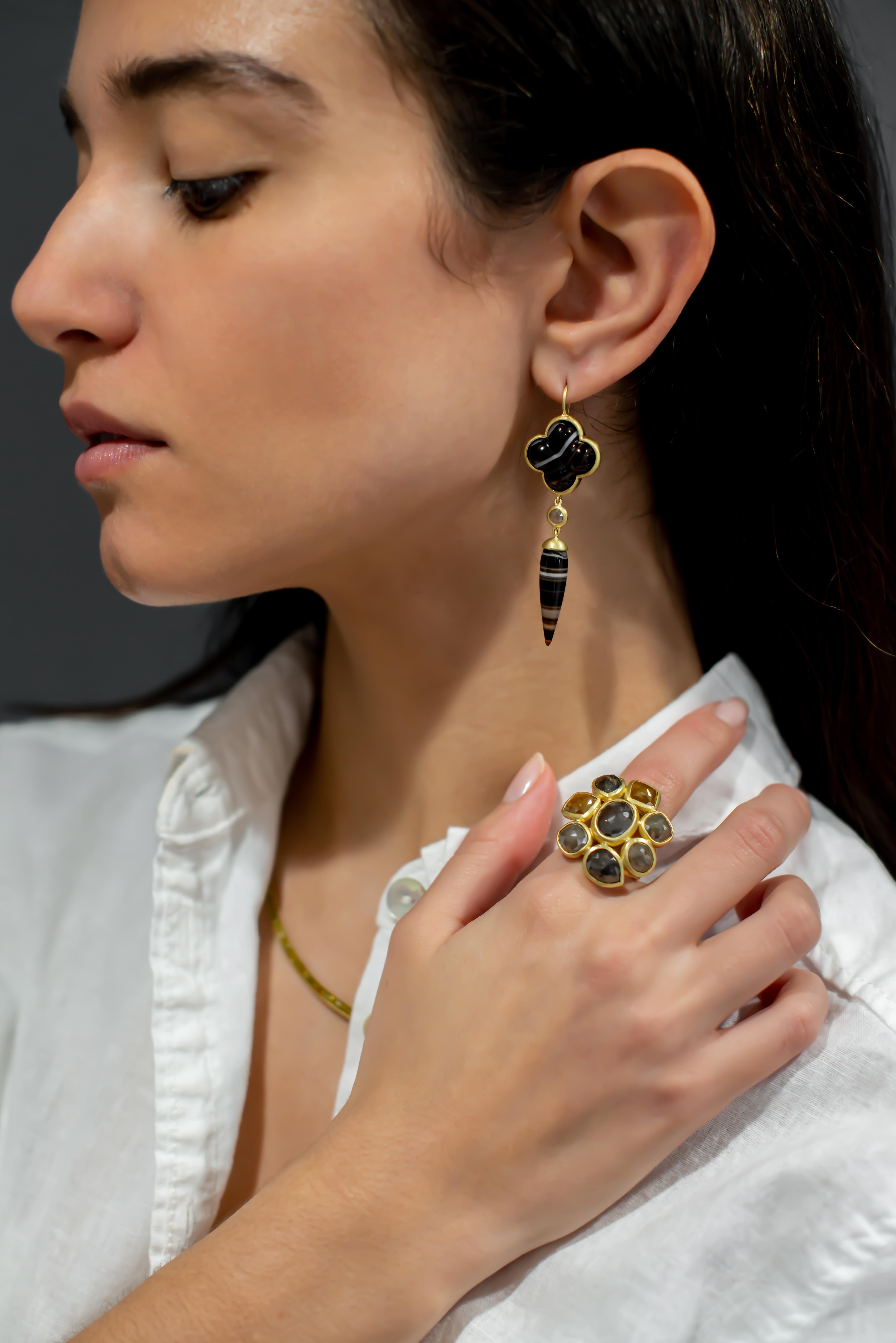 Faye Kim 18 Karat Gold Diamond and Banded Agate Clover Drop Earrings

One of a kind statement earrings!  Spectacular in design and detail.  Circa 1890 Victorian Banded Agate floral motif earrings have been expertly reworked in 18k gold.  Hinged