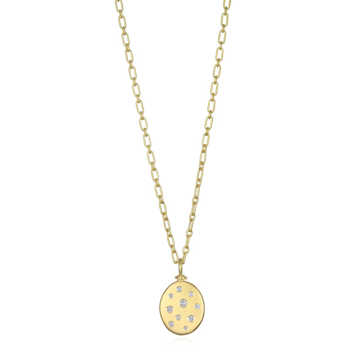 Versatile and easy to wear, Faye Kim's 18 Karat Gold Diamond Studded Large Dog Tag with its hinged bail and matte finish is perfect for every day. Perfect for any occasion, this piece can be worn alone or layered and will elevate your style to