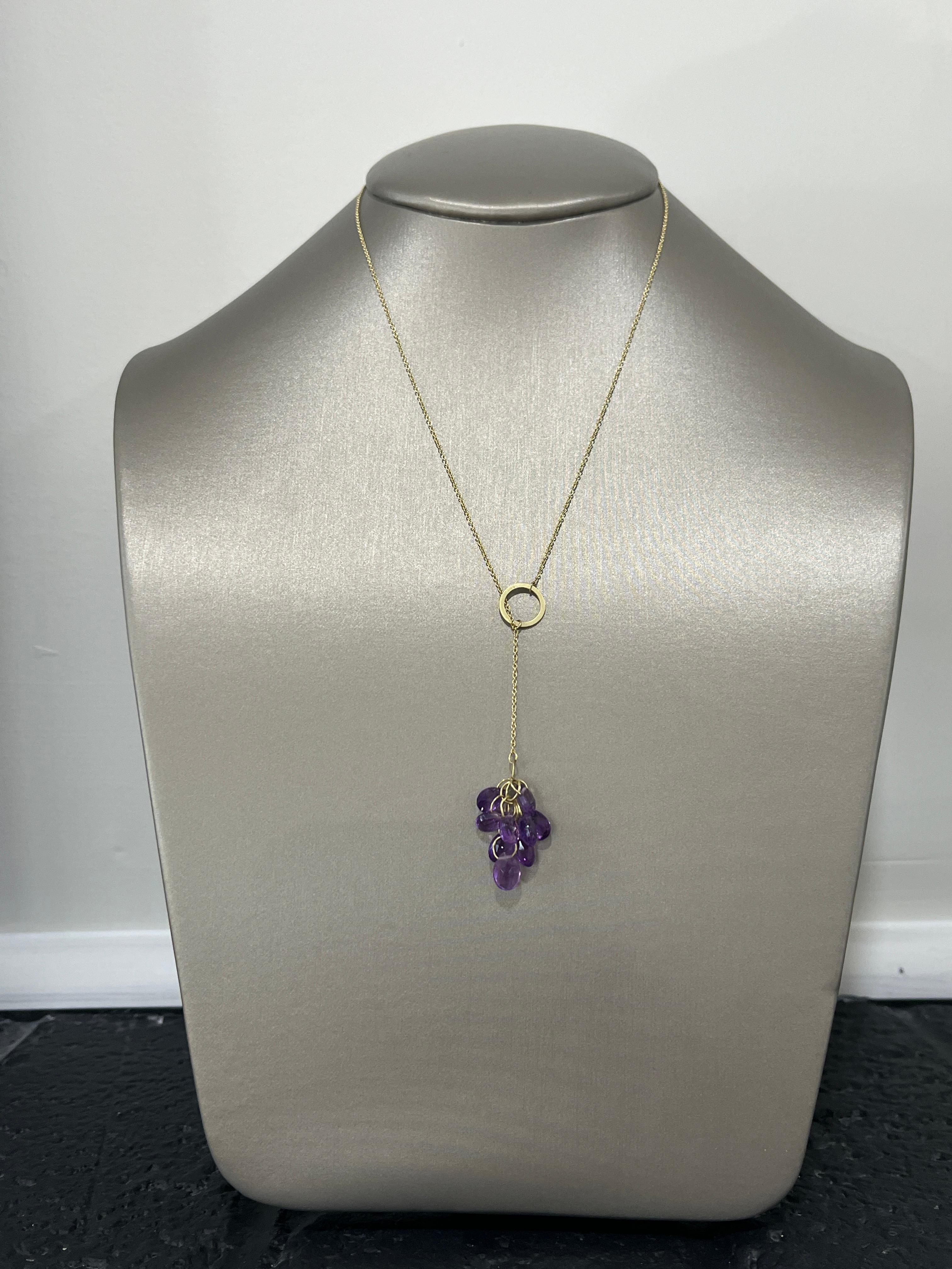 Faye Kim's 18 Karat Gold custom handcrafted Amethyst Y Necklace, with its briolette cluster pendant, offers an effortless, timeless style, perfect for everyday wear or special occasions. Great for layering with shorter pendants.

Length