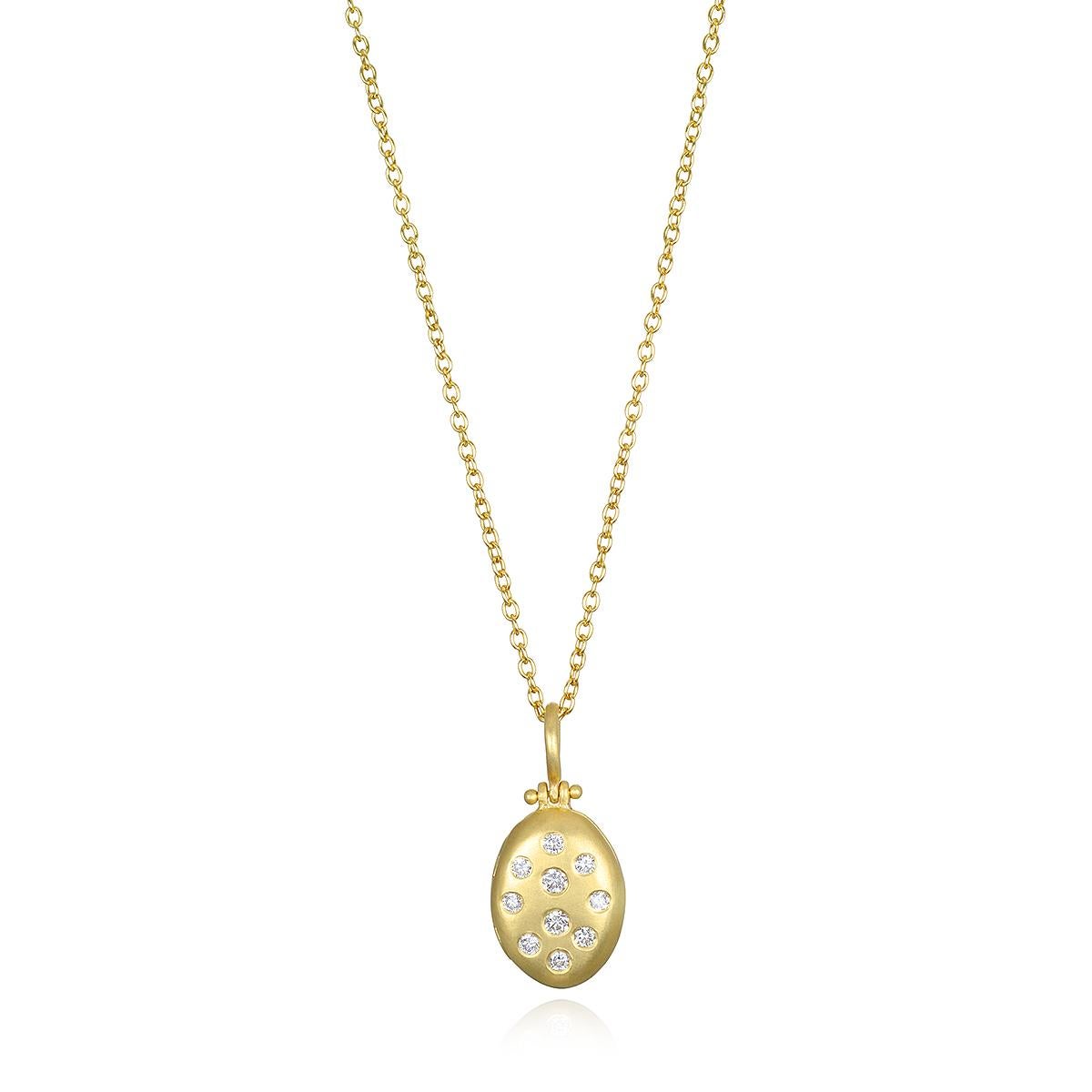 Faye Kim's 18 Karat Gold and Diamond Small Oval Locket combines substance with style, and offers just the right amount of sparkle. Finely handcrafted and matte-finished, this locket can be personalized with an engraving, and layered with other