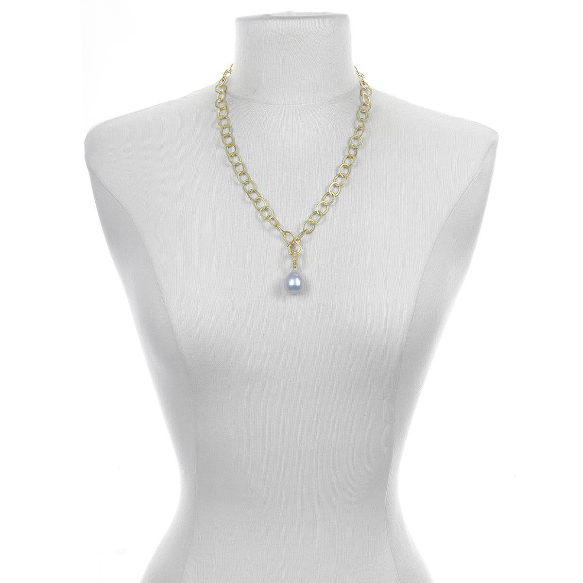 Faye Kim's 18 Karat Gold and Diamond White South Sea Baroque Pendant is fresh, clean, modern and timeless, and the diamond granulation bead bail adds just the right amount of sparkle. The pearl pendant in some photos is shown on an 18 Karat Gold
