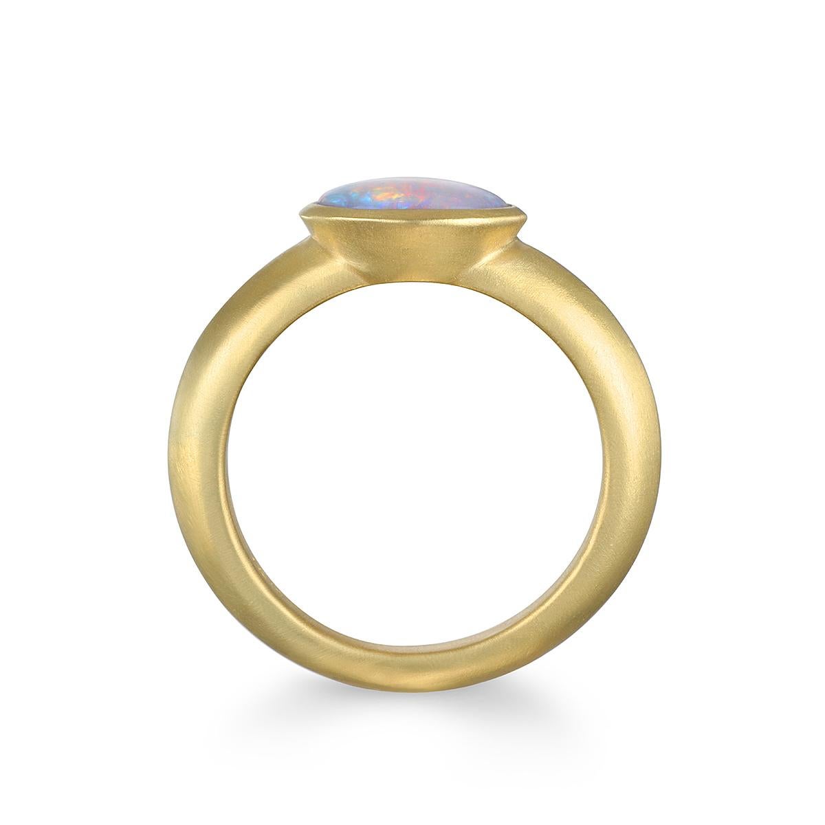 Faye Kim's one-of-a-kind Australian Opal is set in a matte finished 18 karat gold bezel. The ring is striking worn alone or stacked with other rings, and is sure to be a conversation starter.

1.13 Carats
Size 7, can be resized
Bezel dimensions 10.6
