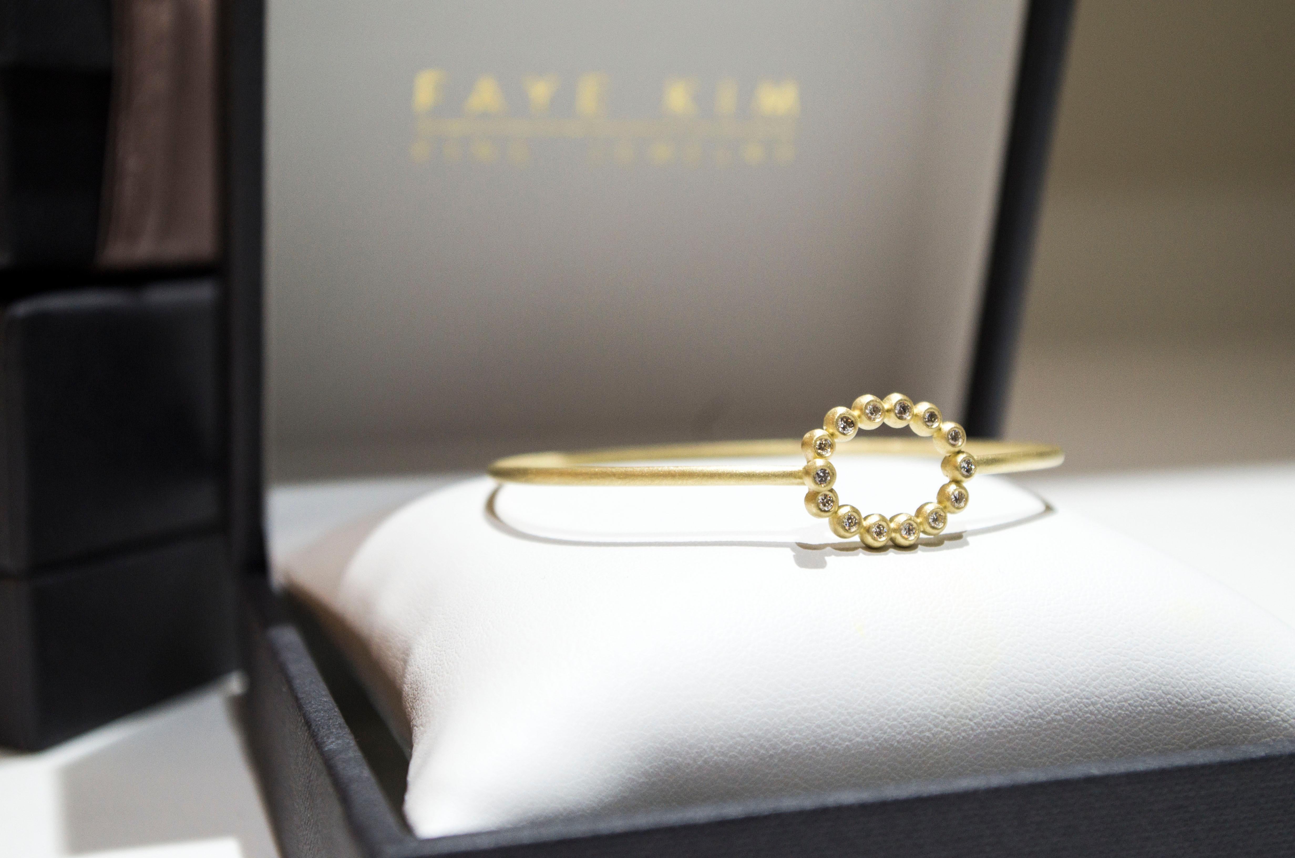 Round Cut Faye Kim 18 Karat Gold Bangle with Oval Diamond Closure For Sale