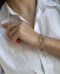 Faye Kim 18 Karat Gold Bangle Bracelet with Oval Diamond Closure, 0.31tcw