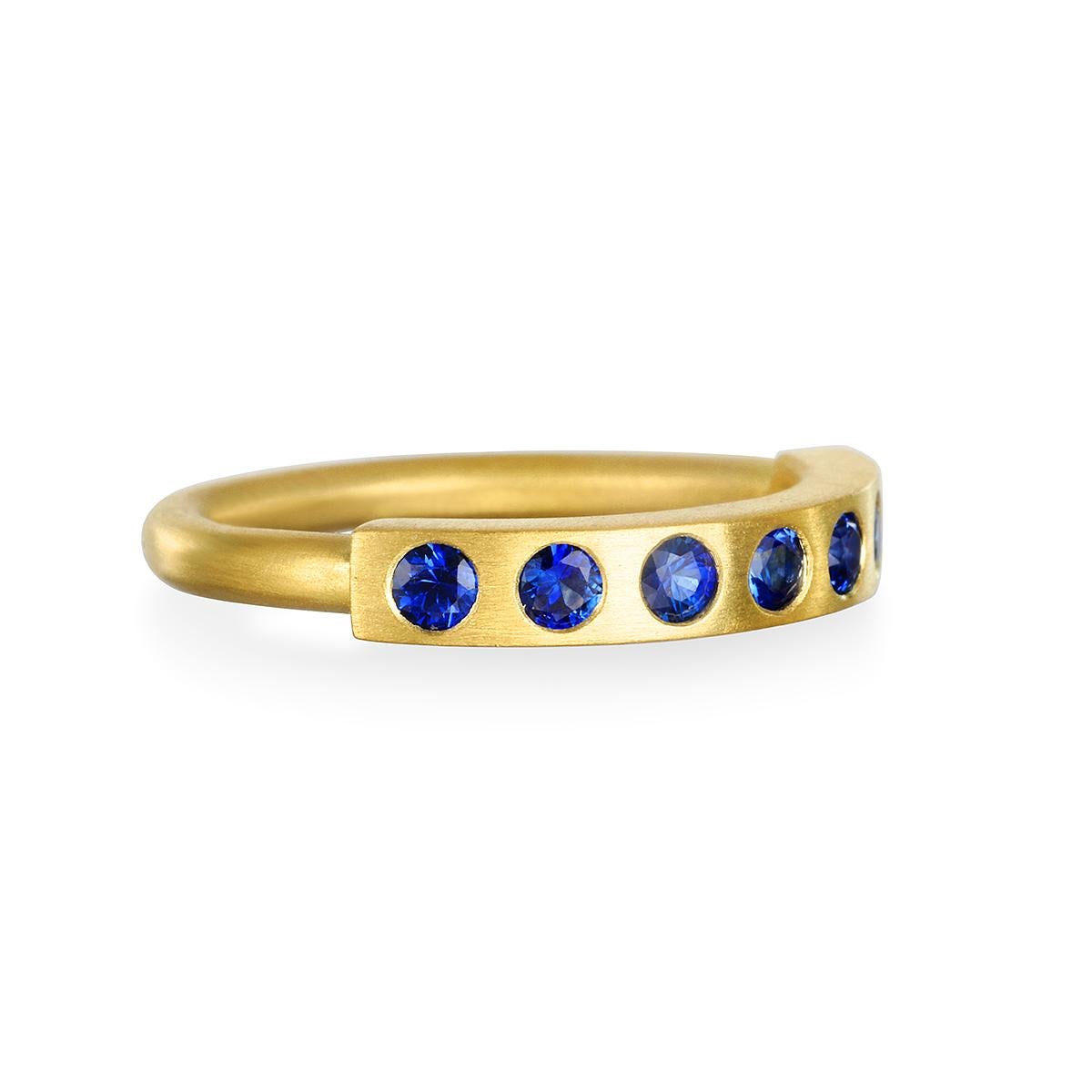 Blue Sapphire - Brilliant, Happy, and Stackable!

Faye Kim's 18 Karat Gold Blue Sapphire Handmade Burnished Bar Ring can be worn alone or mixed and matched with other rings to brighten up your everyday style and add sparkle to your wardrobe. Perfect