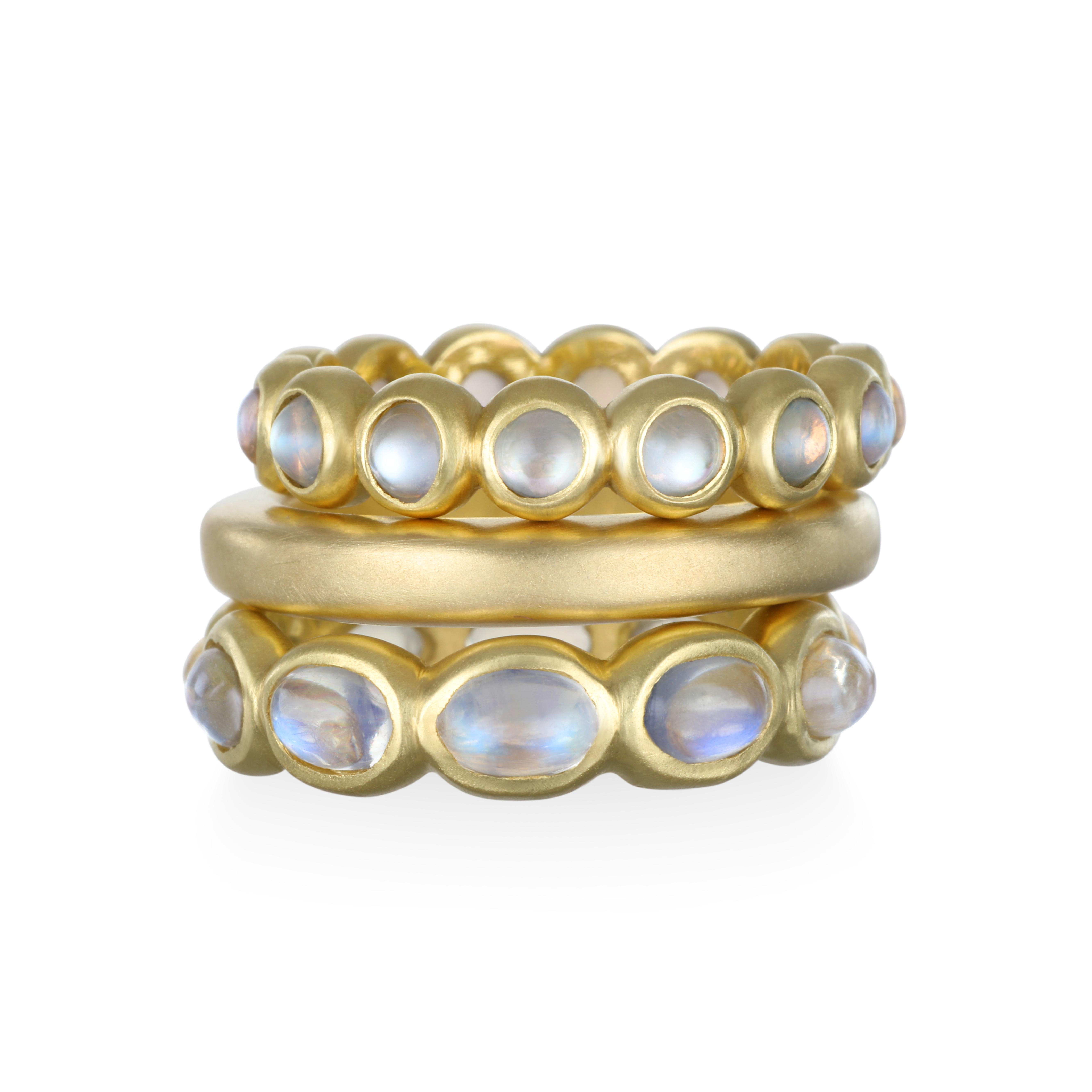 Faye Kim 18 Karat Gold Burmese Moonstone Eternity Ring

Faye Kim has set spectacular Burmese Moonstone cabochons into her signature 18 karat gold matte-finished bezels. The fiery blue incandescent stones are ethereal, and the eternity-style band can