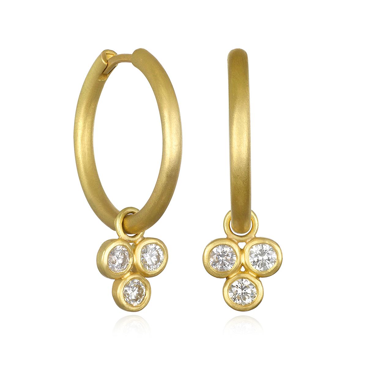 Faye Kim's 18 Karat Gold Hinged Burnished Diamond Hoops with Detachable Triple Diamond Drops - 
The hoops can be worn separately; they can also be worn with the diamonds in the front or reversed to show the gold side. The drops can be attached to
