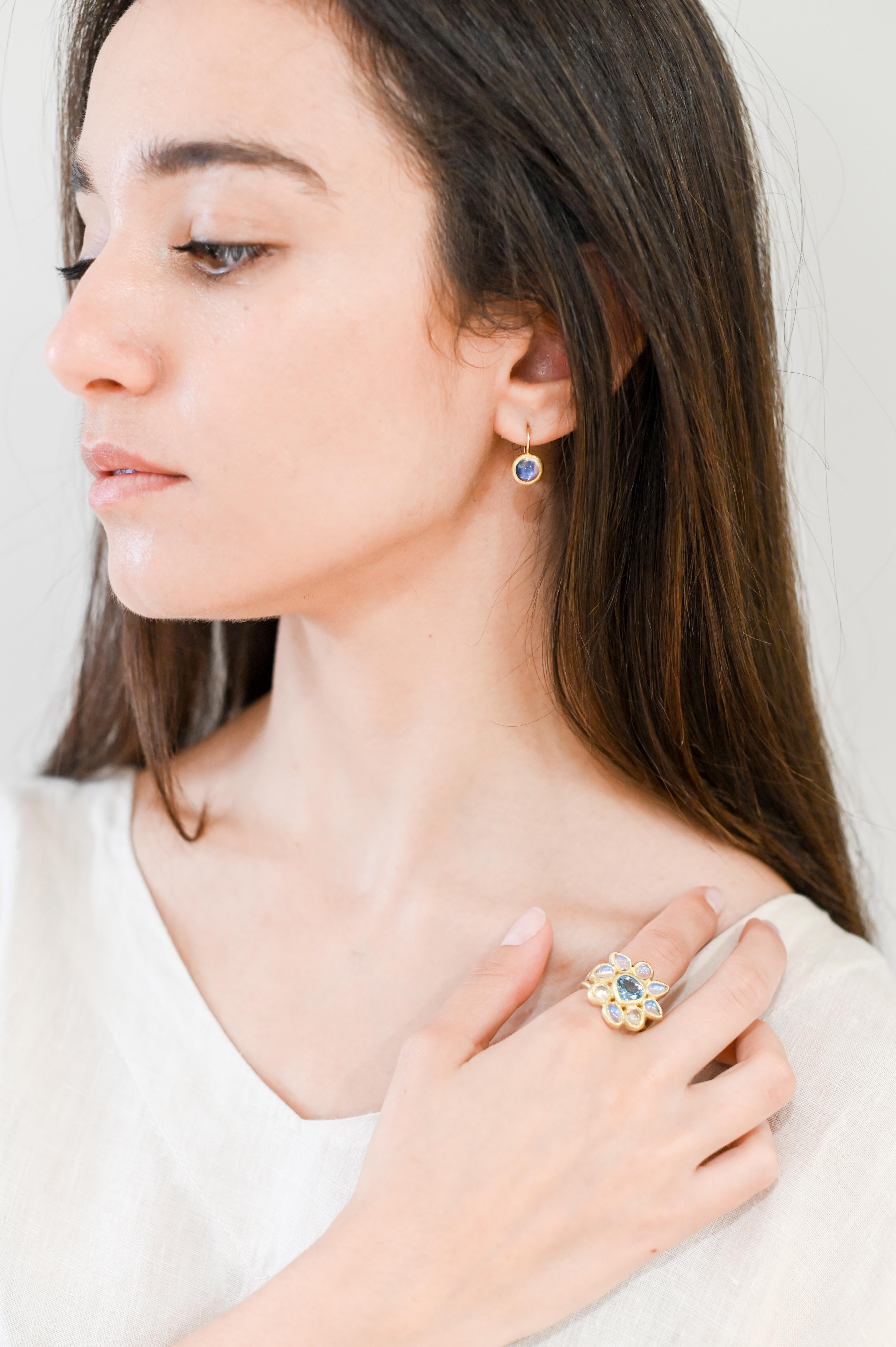 Faye Kim 18K Gold Moonstone Leverback Earrings

The perfect go-to earrings.  Incredible Ceylon moonstone with blue flash set beautifully in a bezel setting.  These understated elegant earrings go effortlessly from day to evening.
Moonstones:  2.60