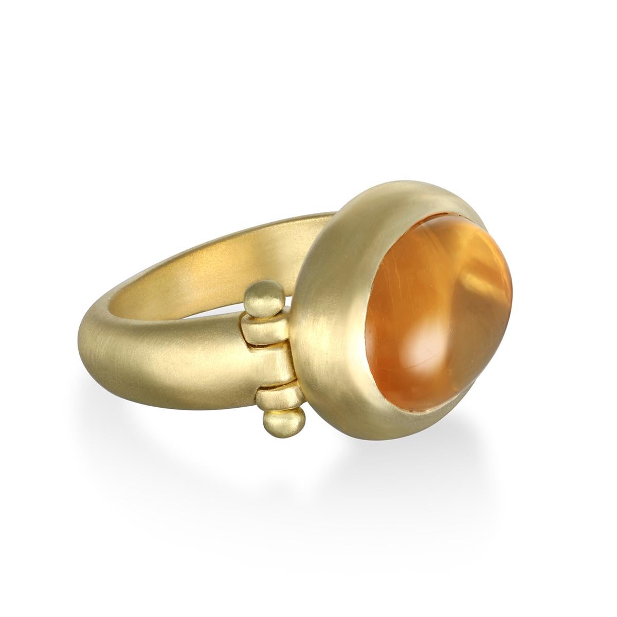 Faye Kim's 18 Karat Gold Citrine Hinged Ring, with its oversize stone, warm orange/yellow hue and half round shank, is beautifully bezel set and matte finished. The ring can be worn for any occasion.

Citrine 9.0 Carats
Bezel length x Width 20mm x