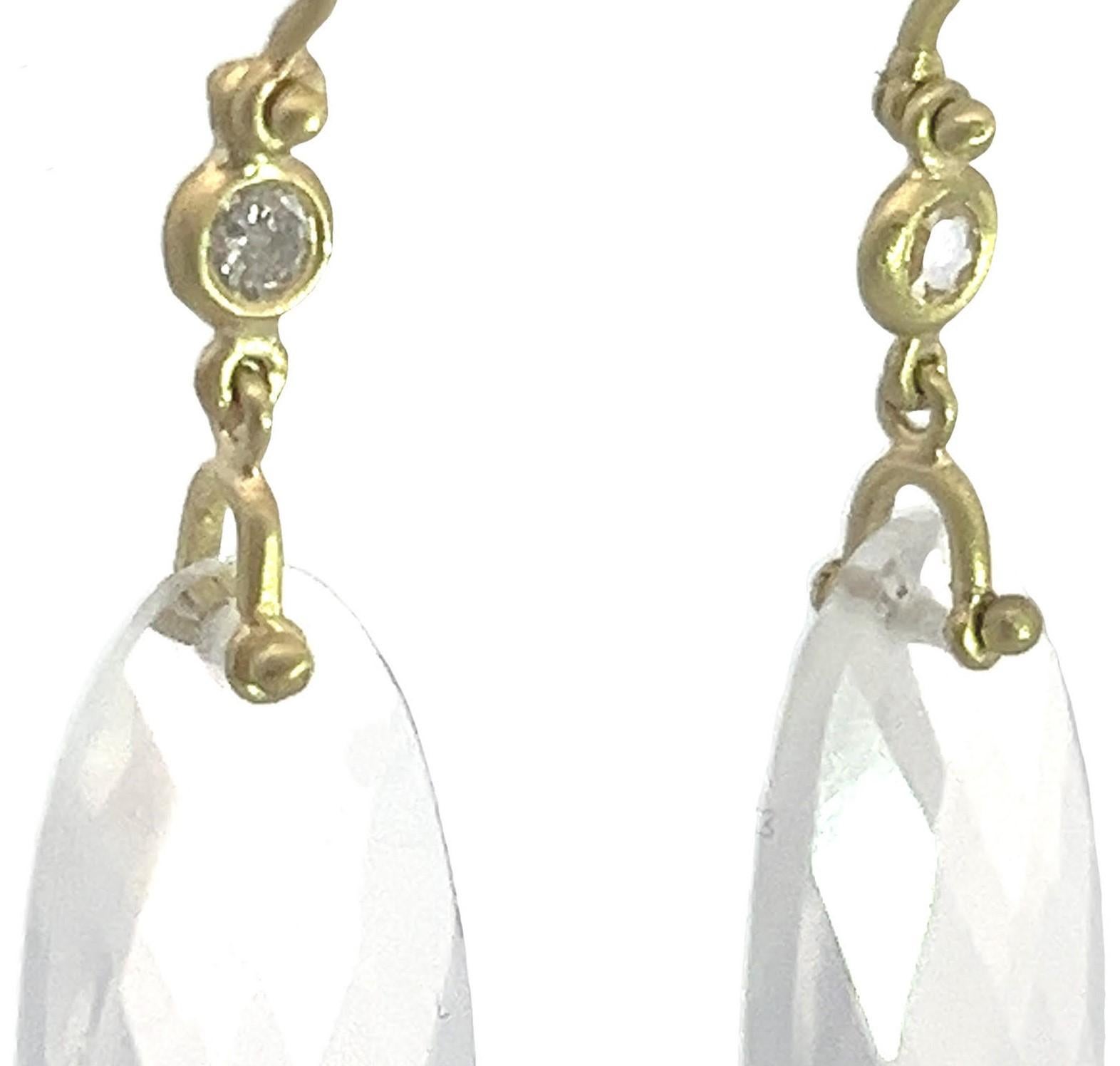 Faye Kim's handmade 18 Karat Gold Crystal Quartz and Diamond Leaf Earrings feature a faceted leaf-shaped crystal quartz suspended by a gold hinge beneath a bezel set round diamond. Matte finished and attached to French ear wires, these earrings