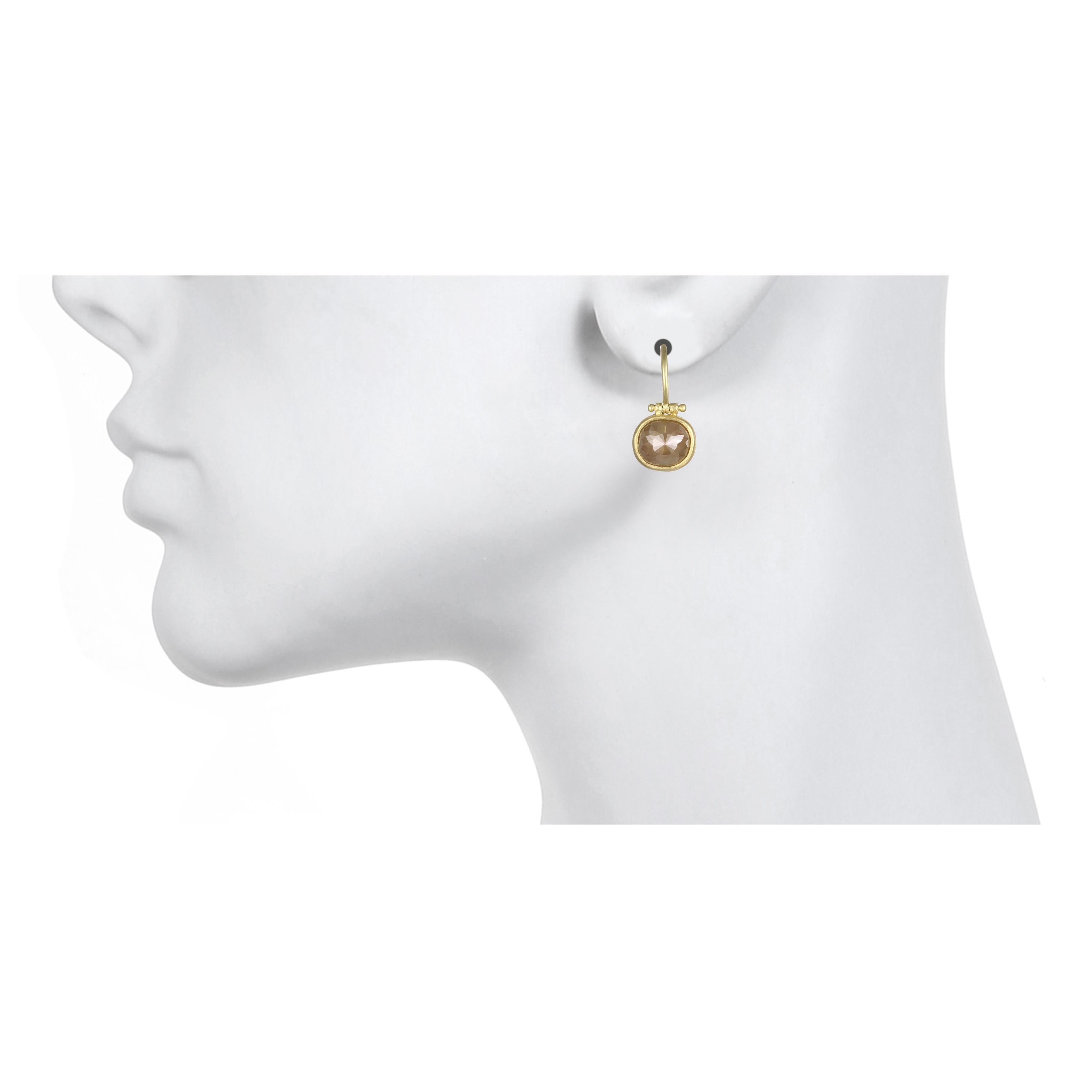 The contemporary and classic elements of this design are what makes these drop earrings essential to every jewelry collection! Handmade in 18k, cushion shaped, faceted rose cut raw diamonds are bezel set.   Granulation hinged ear wires allow