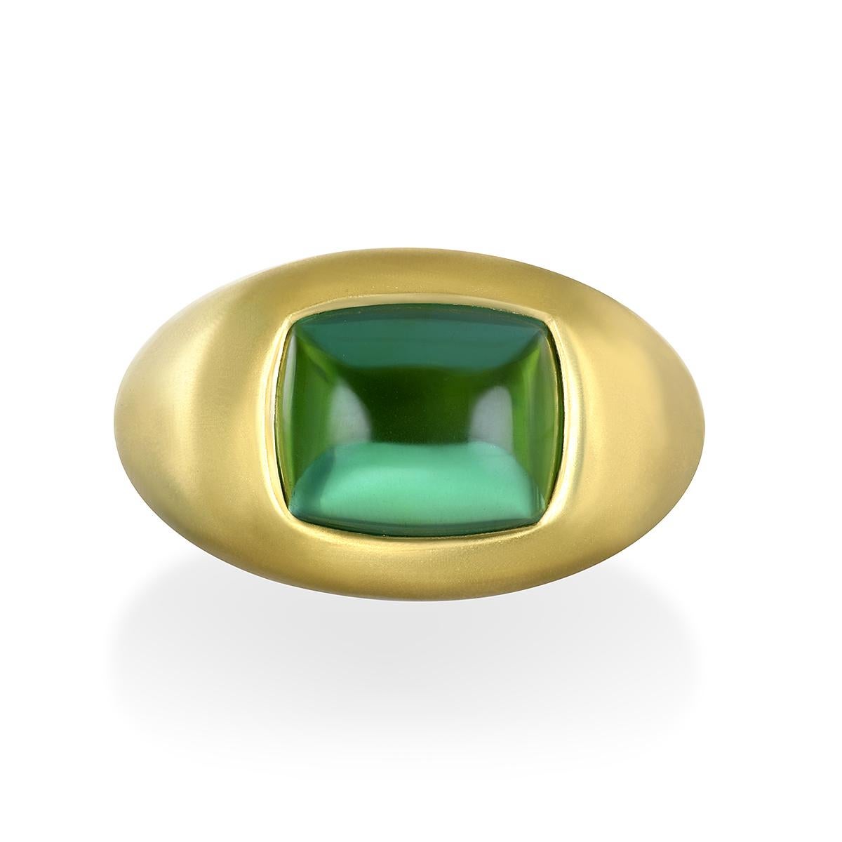 Faye Kim's 18 Karat Gold Cushion Green Tourmaline Cabochon Ring, with its mesmerizing green hue and dome setting, is beautifully is matte finished and can be worn for any occasion. 

Green Tourmaline Cabachon 5.78 Carats
Cabochon dimensions 11 x